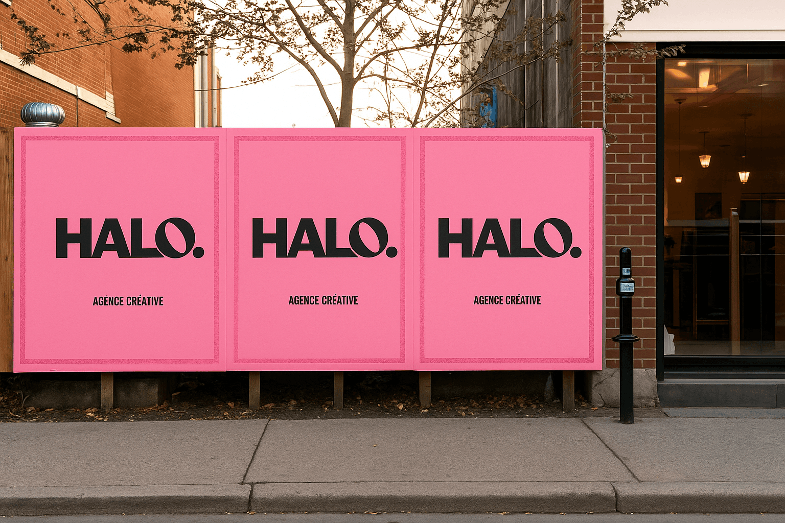 Black and white image of people working at a table with laptops, showing hands gesturing during discussion of digital content displayed on screens, with fabrica® logo in the corner.
