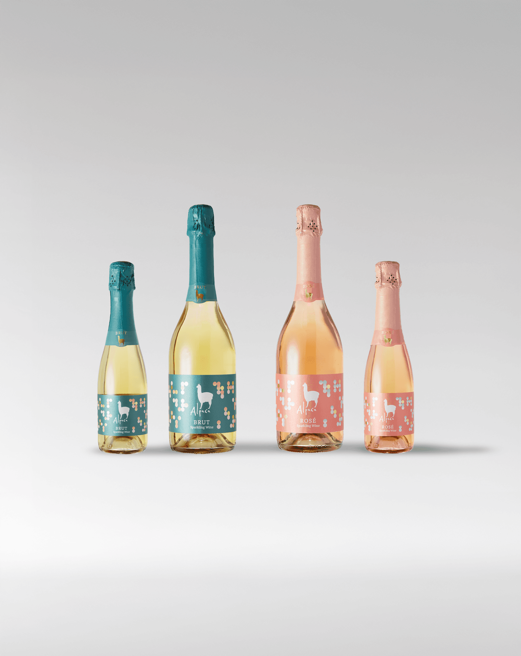 Alpaca Sparkling bottles with colorful playful packaging designed by Josephine Grenier for Japan’s best-selling wine brand.