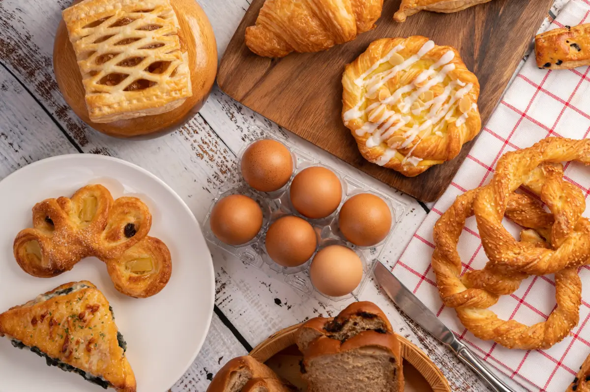 Delicious pastries and eggs on a table