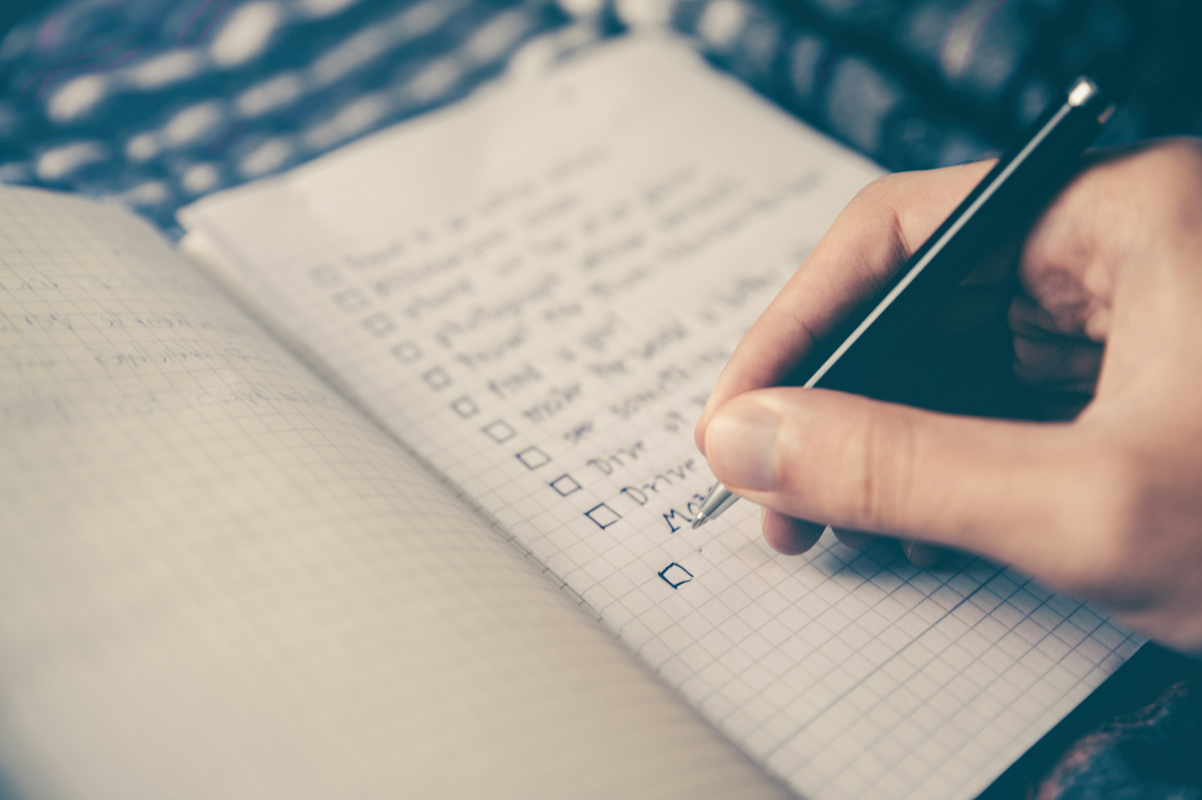 Person Making ToDo List - Todoist Alternatives