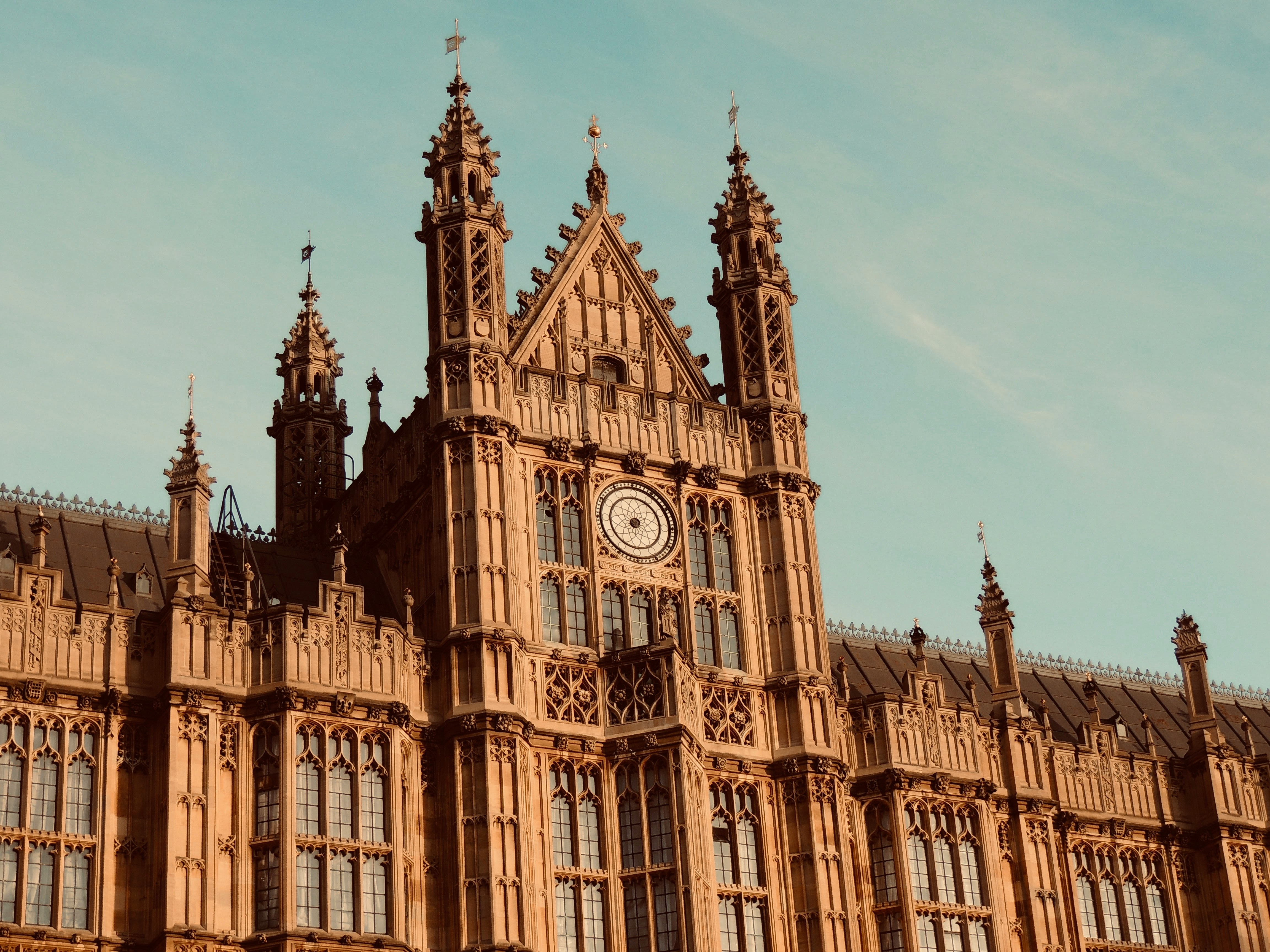 brown concrete building under blue sky during daytime