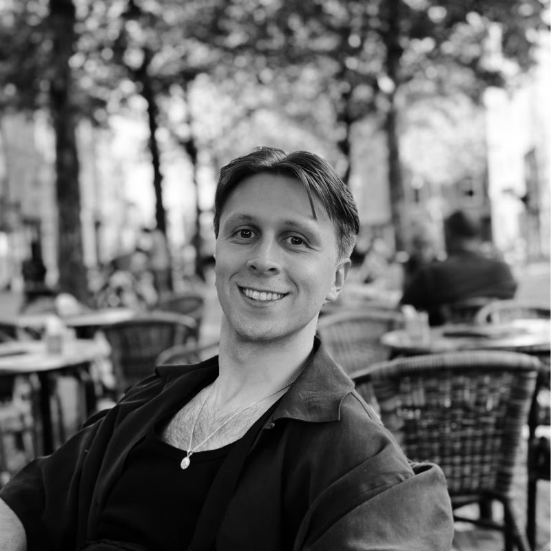 person sitting in a chair in front of a man