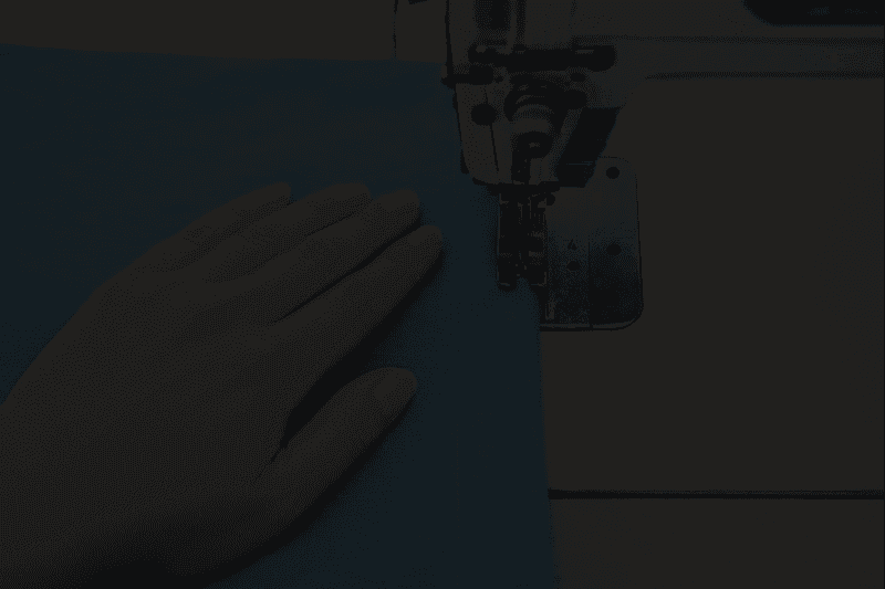 employee who works on the knitting machine.