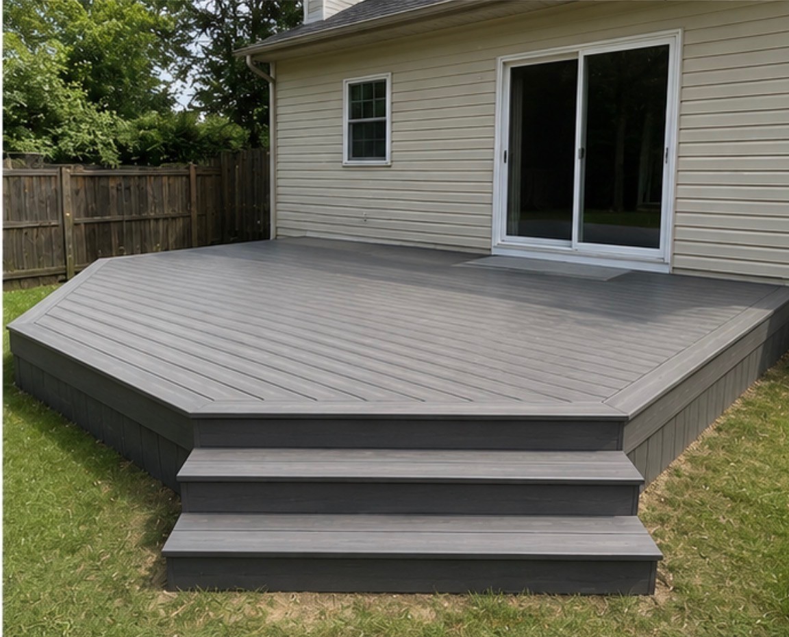 Finished deck with table, railing, and seating area