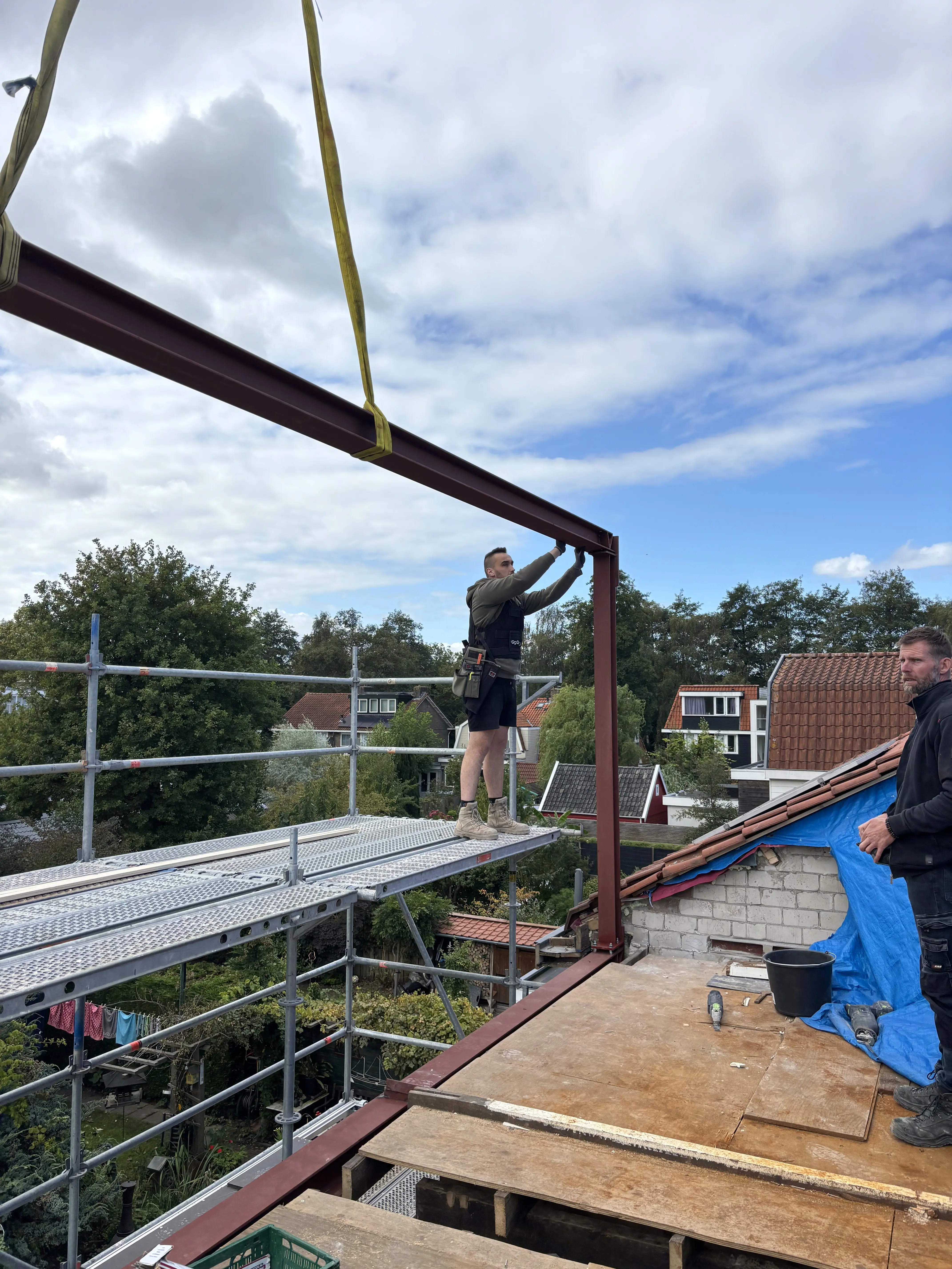 Image of a man in a scaffolding 