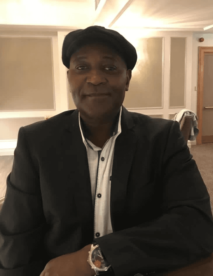 man in blue suit jacket