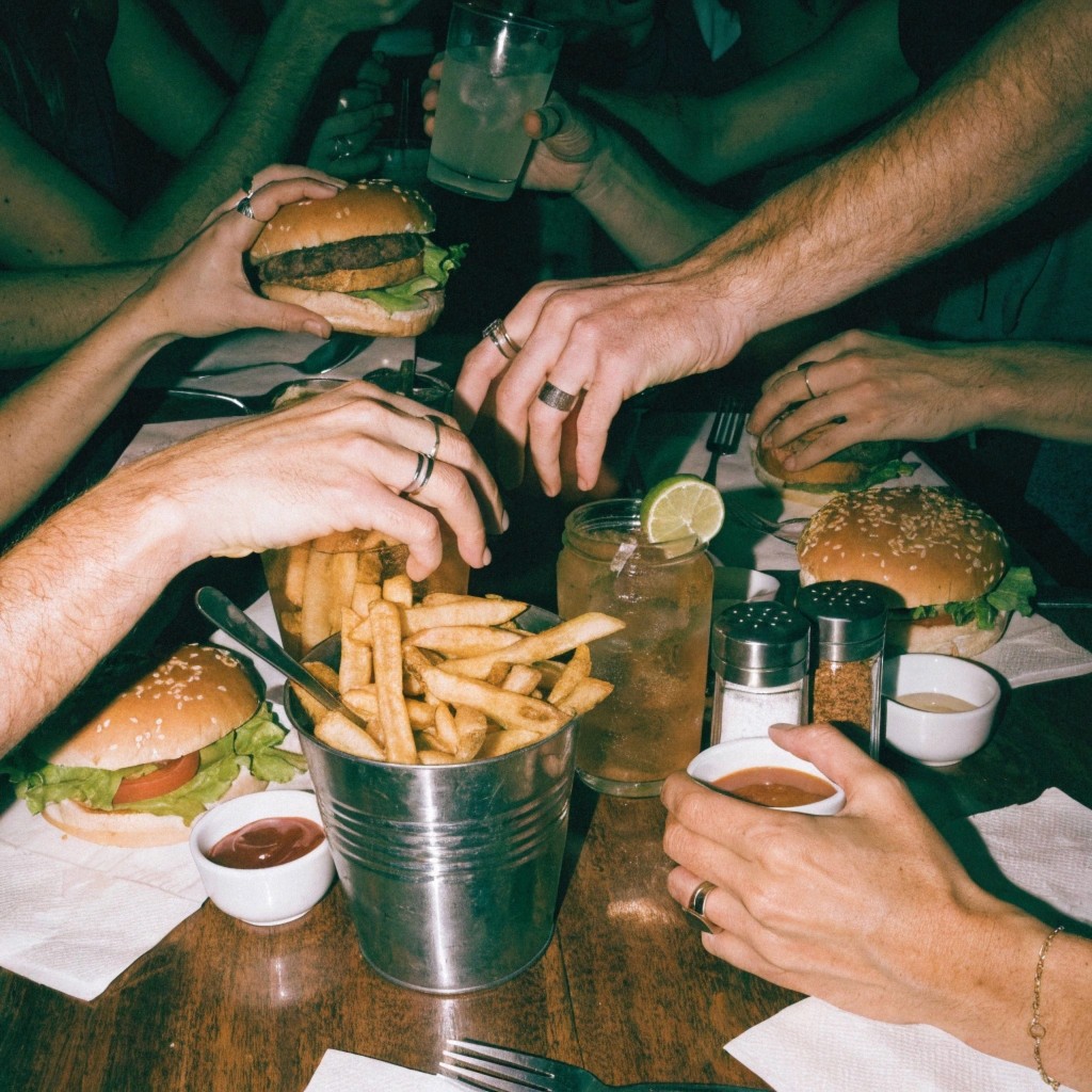 reaching for burger