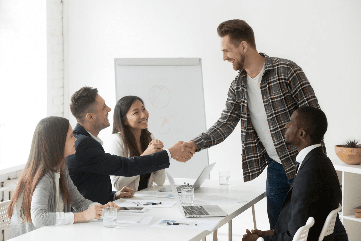 handshake at interview - How to Recruit Software Engineers