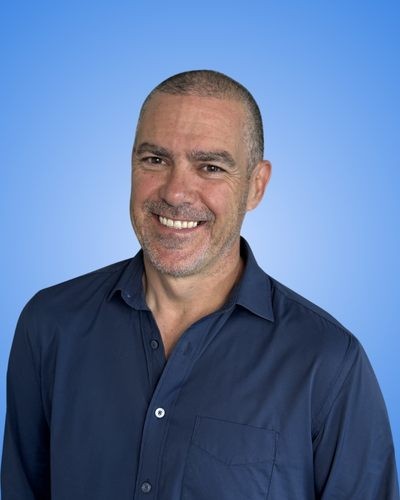 man in white crew neck shirt wearing black framed eyeglasses