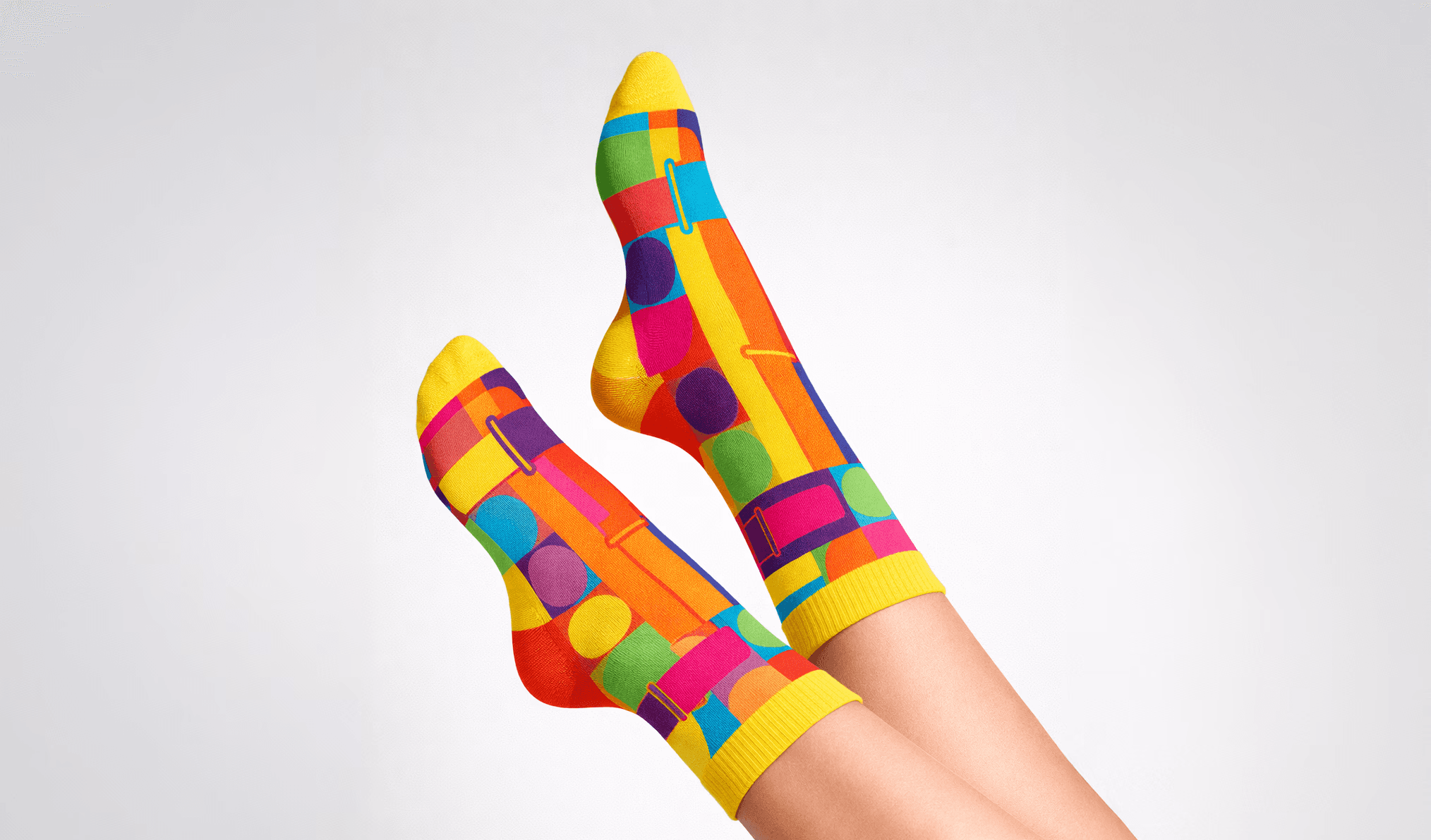 Minimalist lemon product photo with glass cup on pastel yellow background