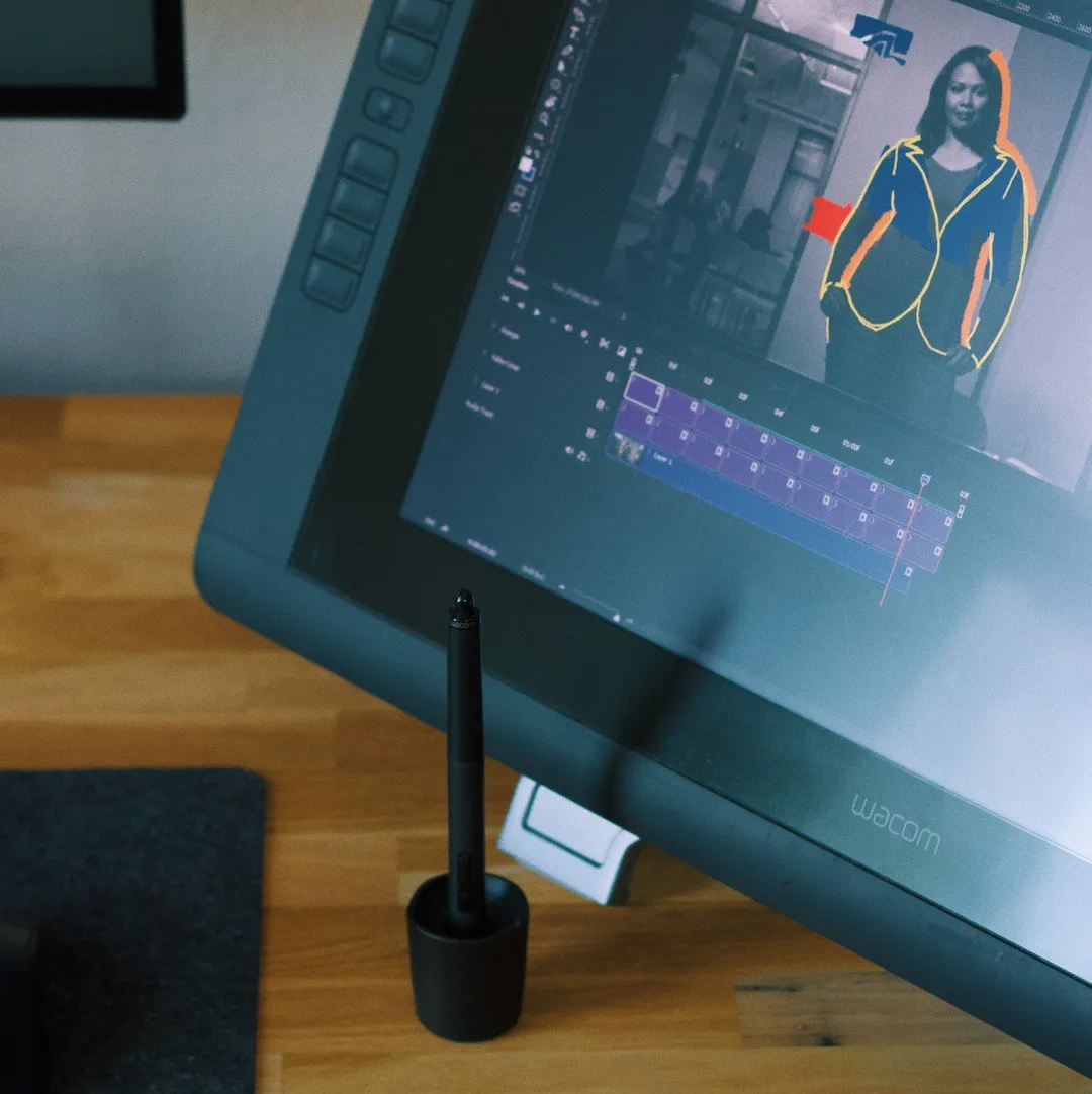 Drawing tablet displaying a motion design timeline and character animation
