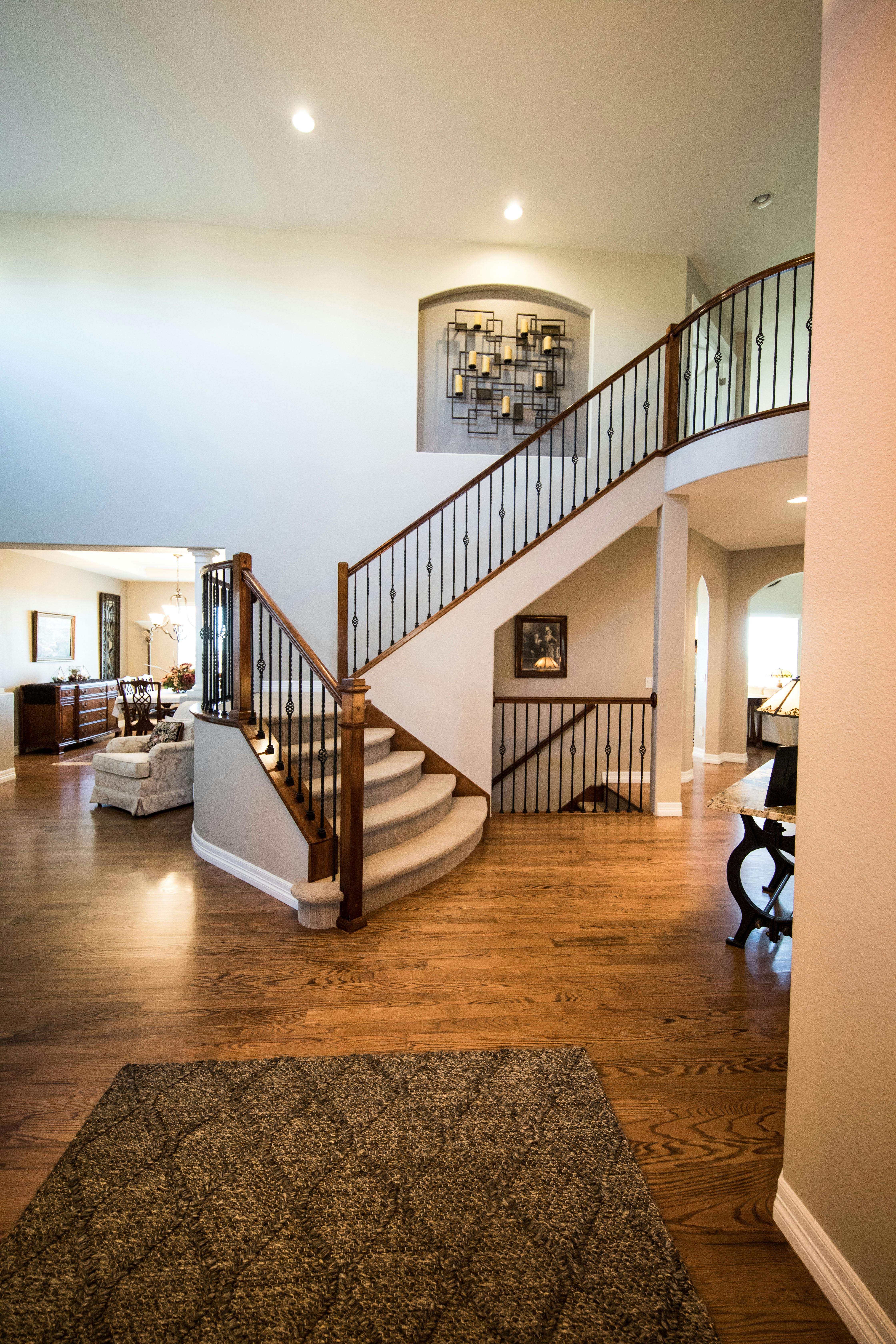 Modern living room interior with large staircase