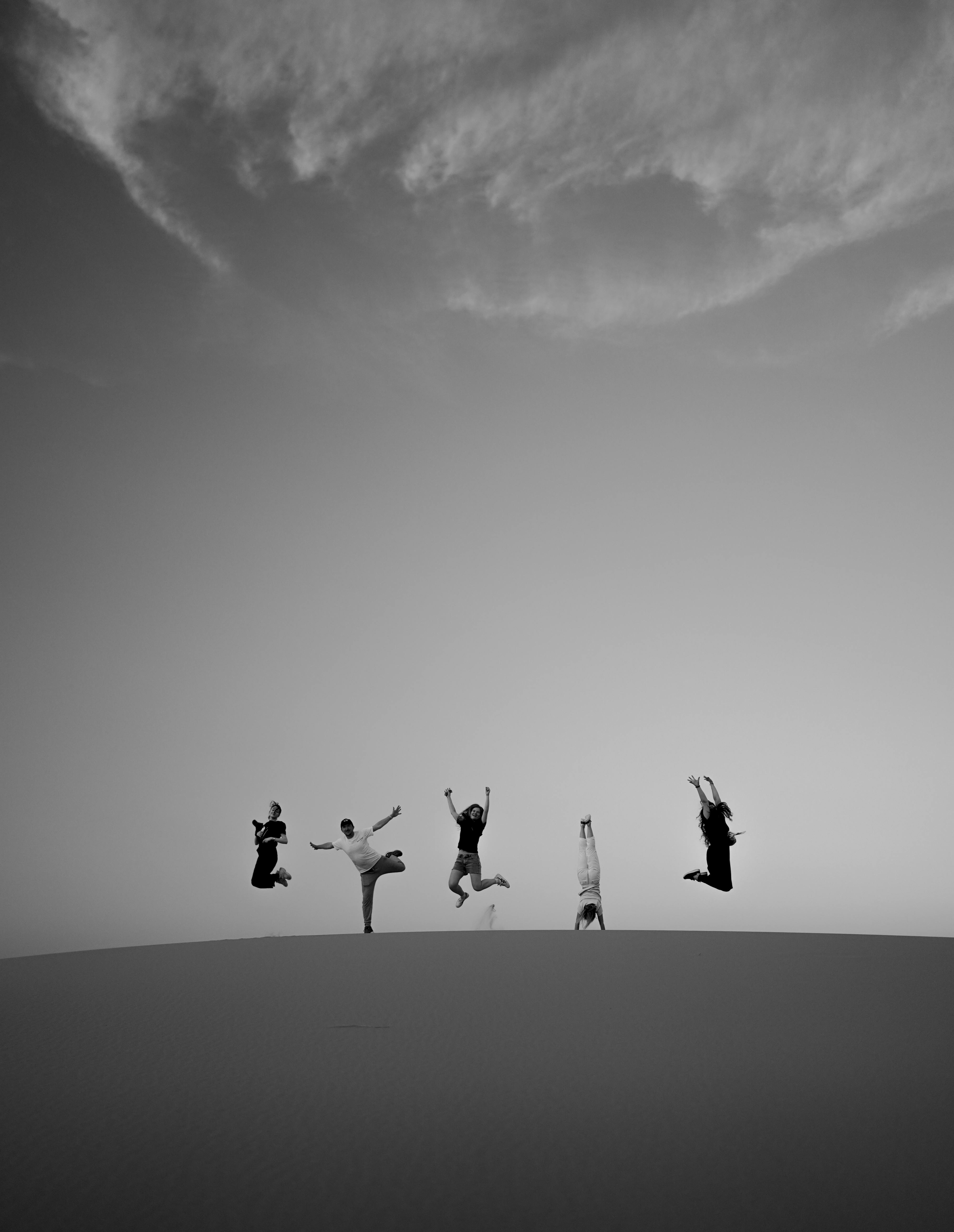 a hand holding a smart watch