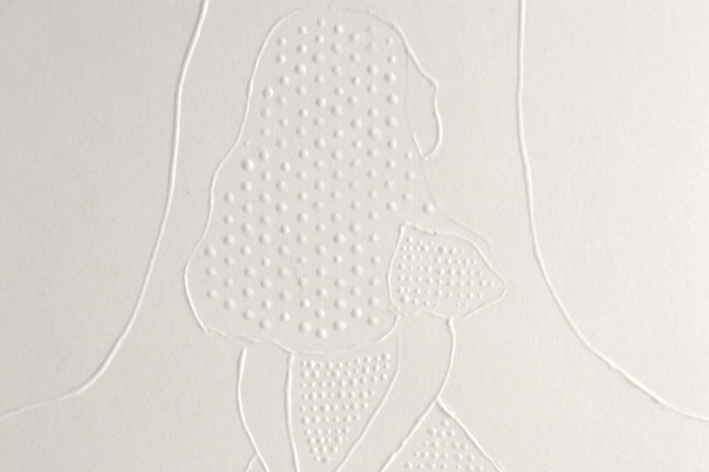 A white relief sculpture of a woman’s profile facing left, viewed from behind. The woman’s hair is composed of small circular dots. Her left arm is raised, and her right arm is bent at the elbow. The sculpture is mounted on a white wall, with visible lines and curves in the surrounding area.
