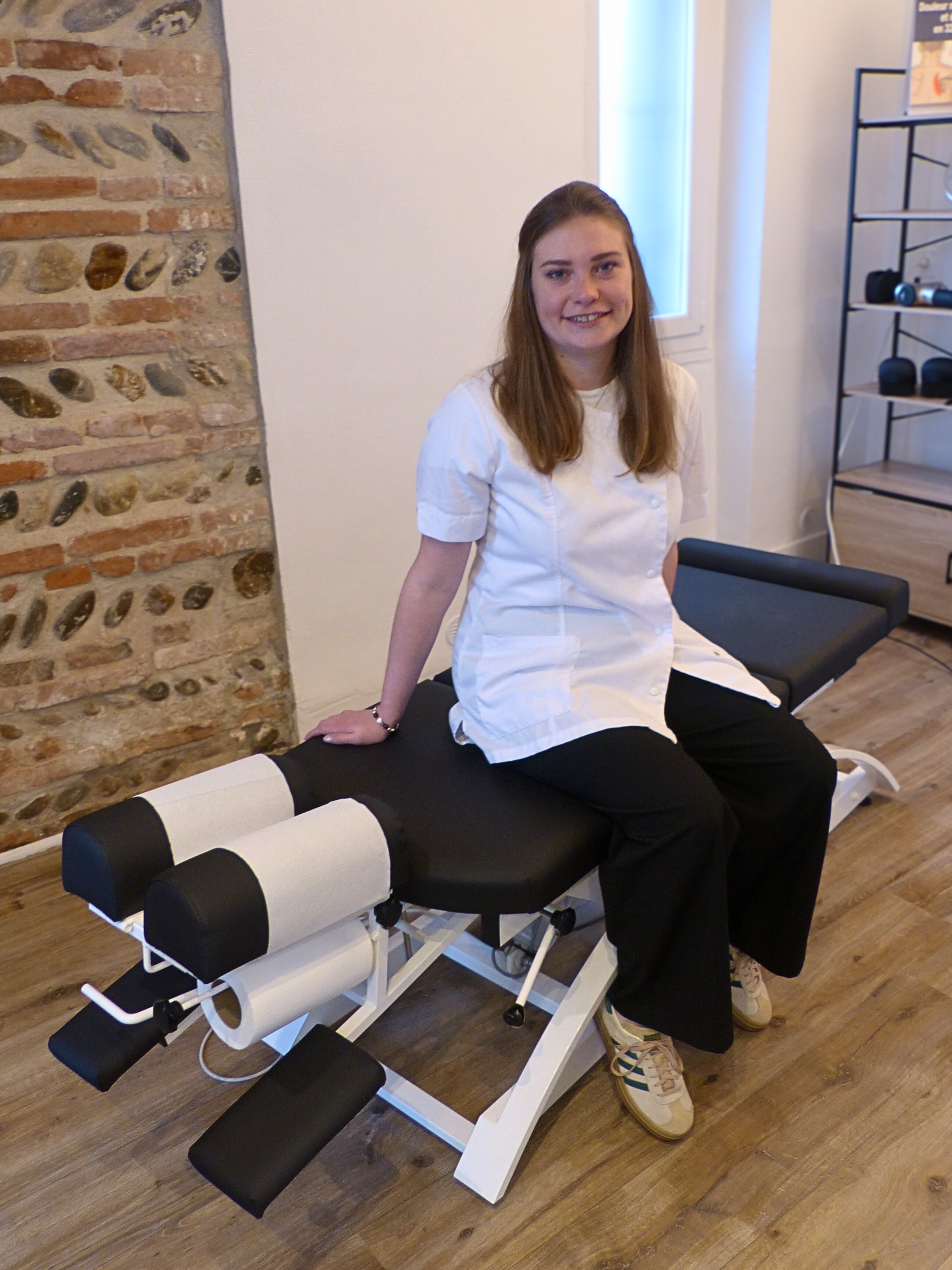 Doctor writing on a patient's chart