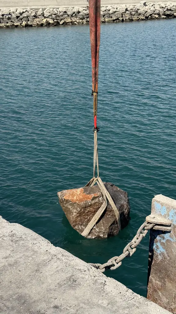recovering a rock from sea bed