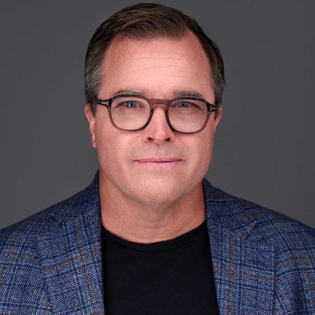 Interior of a classic car with tan seats.