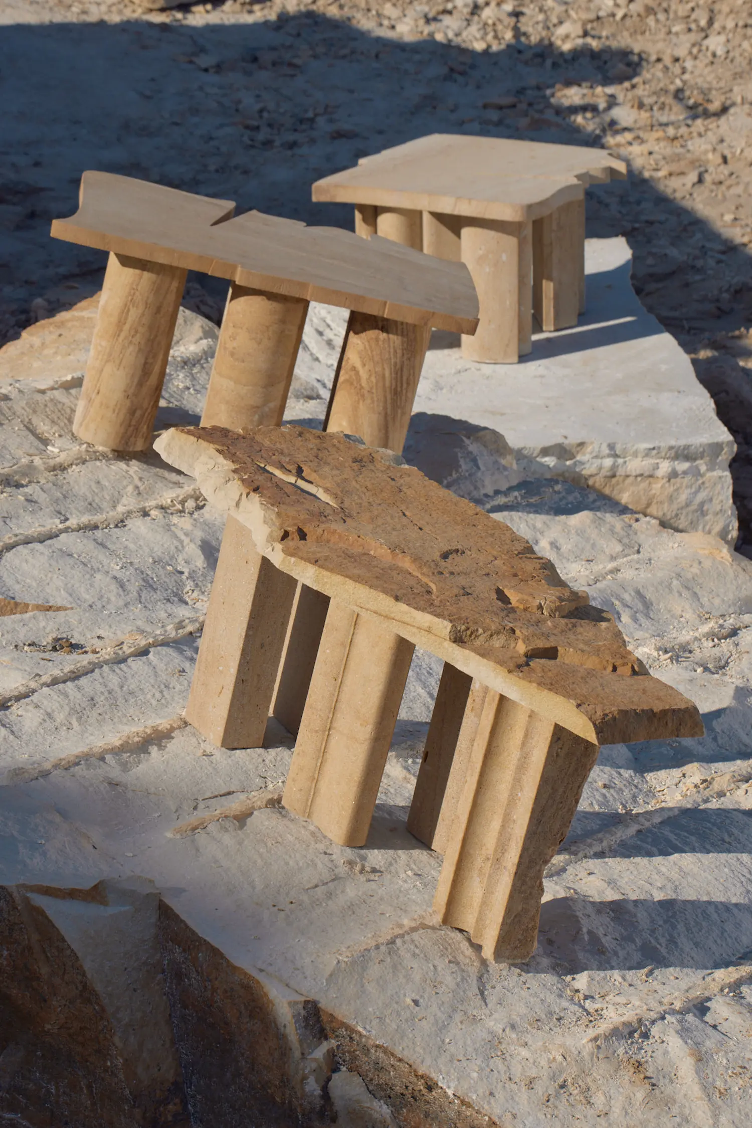 Sand Preludium III quartz sandstone coffee tables on a stone surface by Jiri Krejcirik