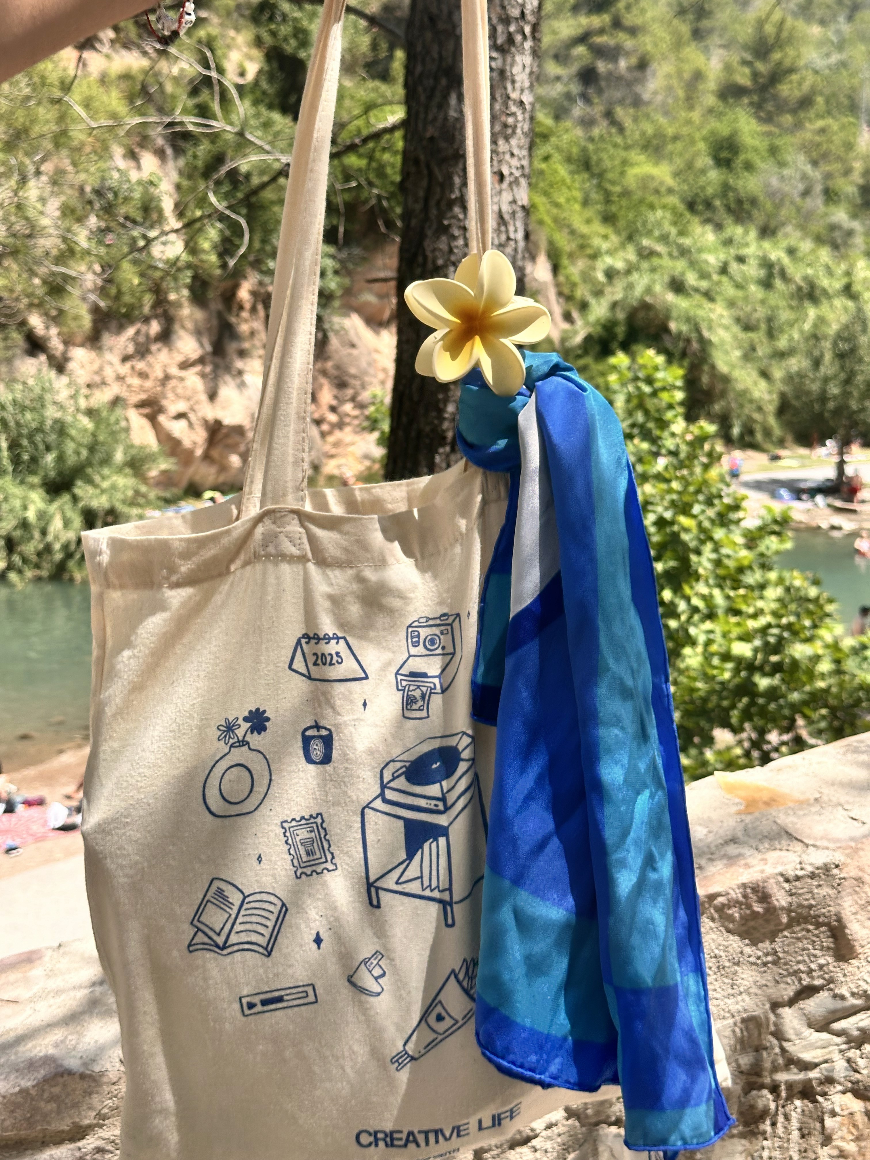A mockup of an iPhone placed on a chair's back