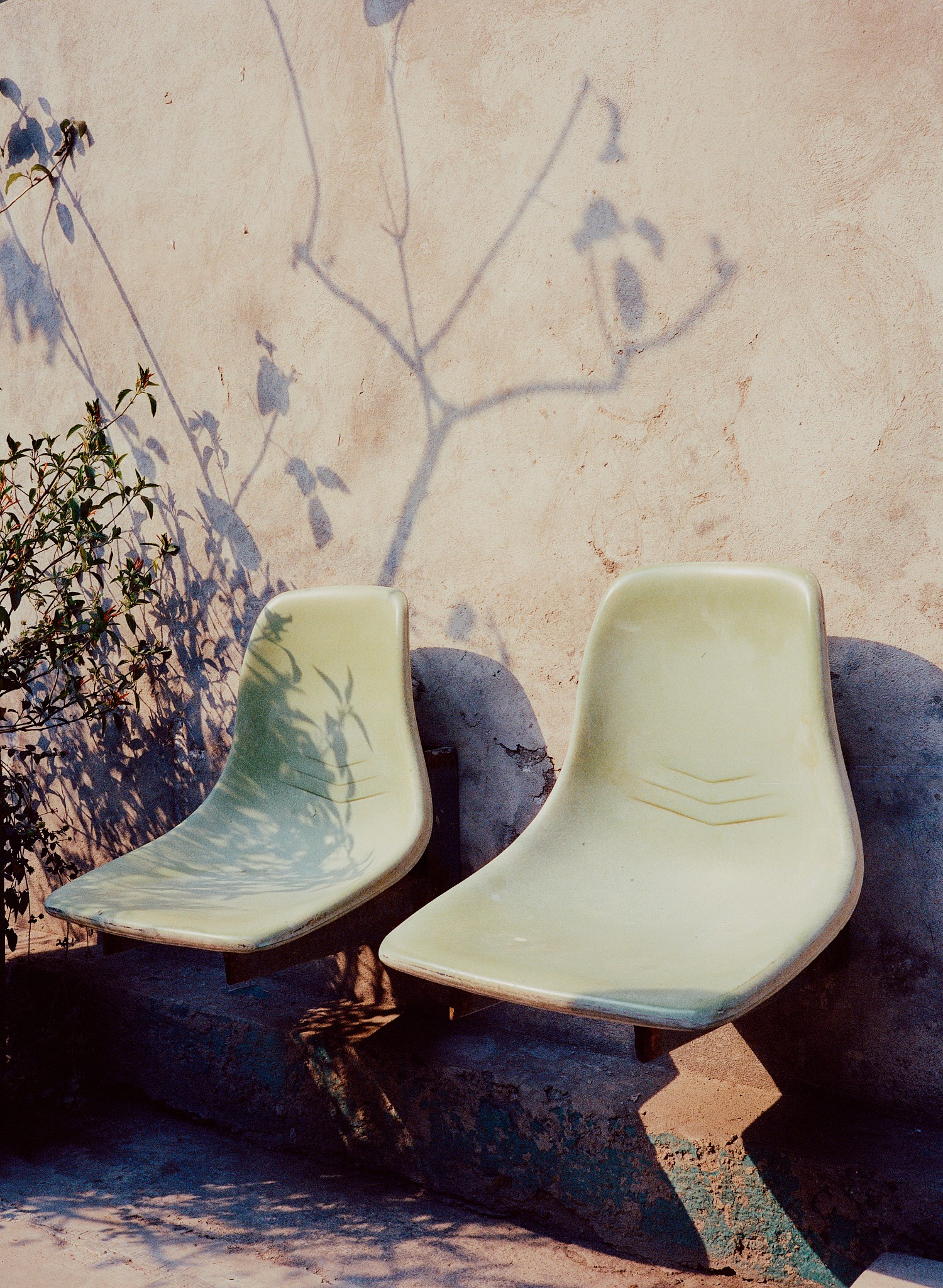 Woman with red hair covering mouth with hair