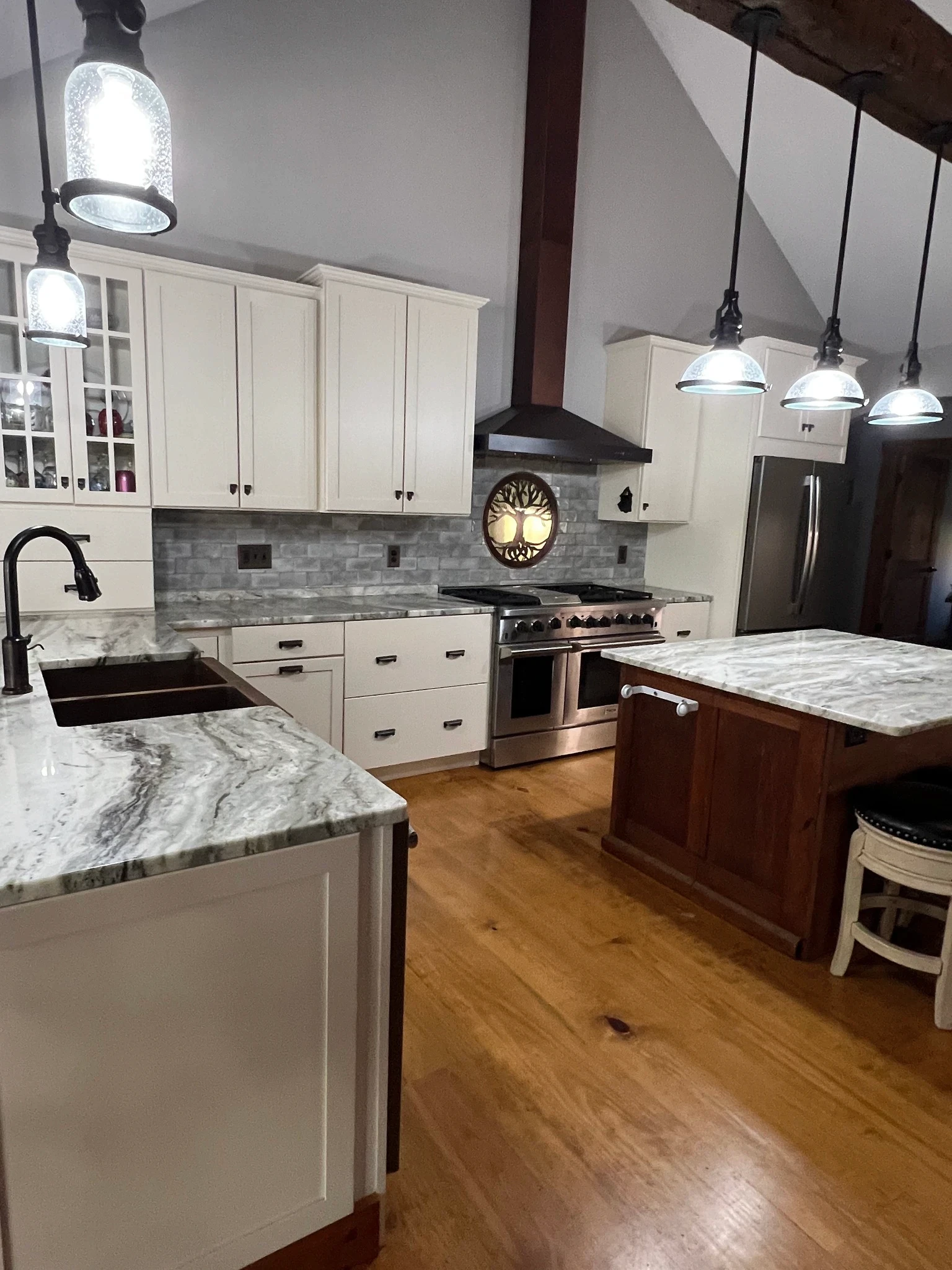 Modern white kitchen with beautiful natural stone countertops