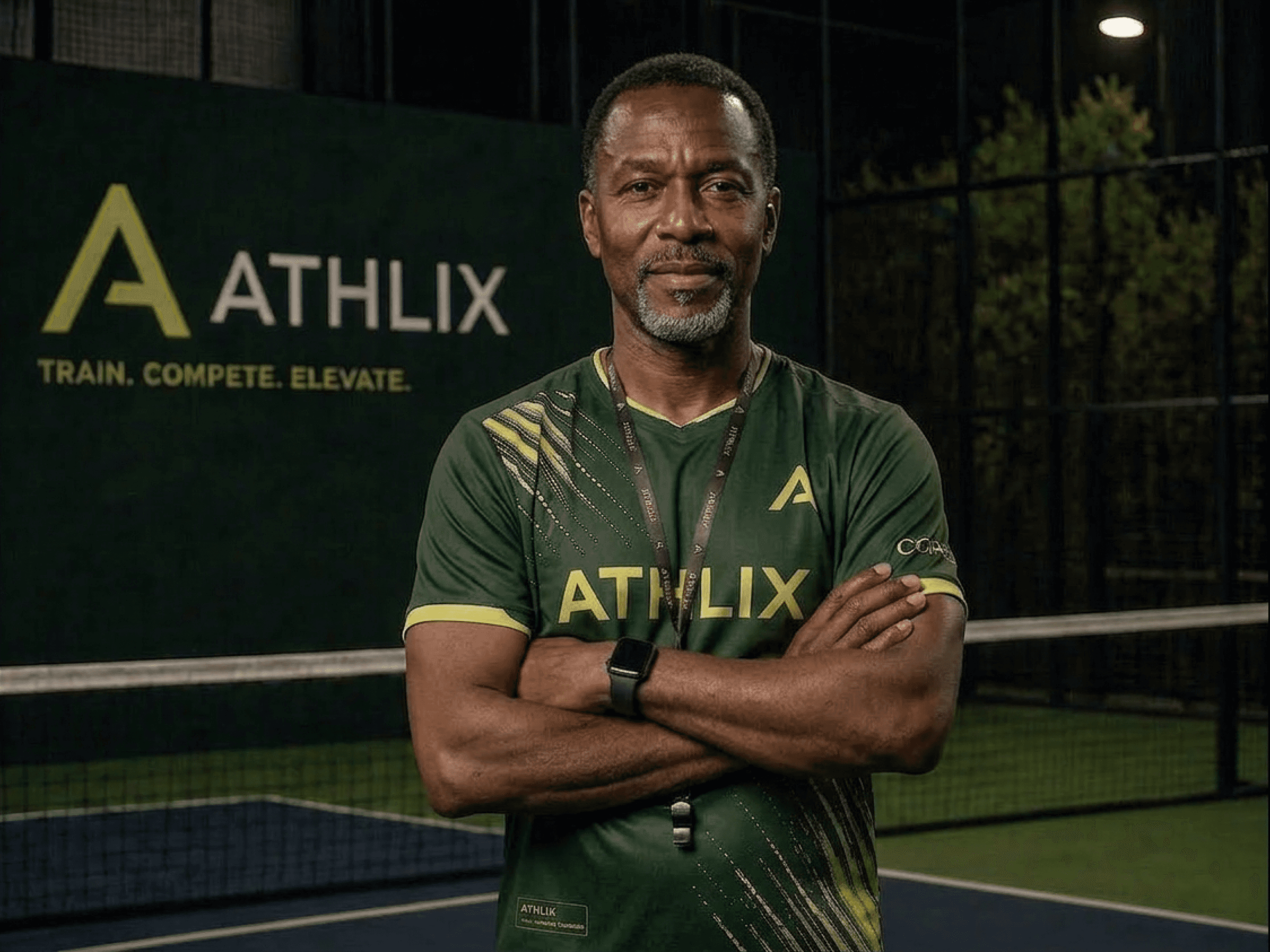 A man jumping in the air with a tennis racket