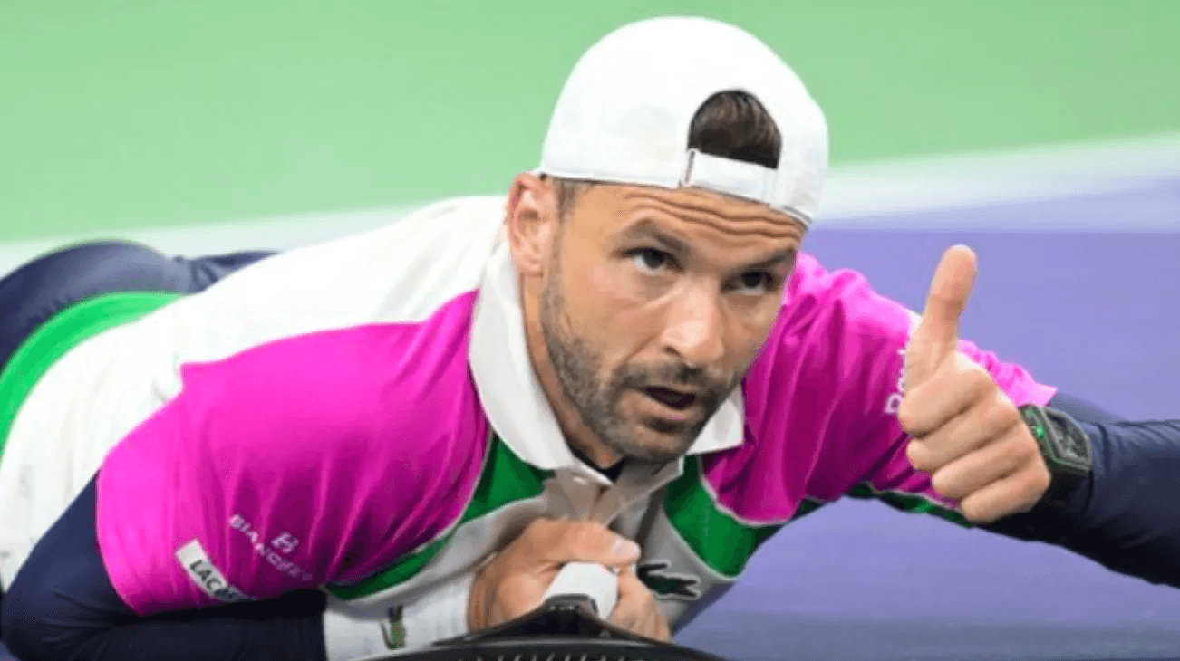 Bulgarian Grigor Dmitrov gives a thumbs up to signal his well-being after diving for a drop shot delivered by fellow trickster Gael Monfils, but maybe those six-pack abs hurt a little more than he let on after the double breadstick delivered by Carlos Alcaraz.