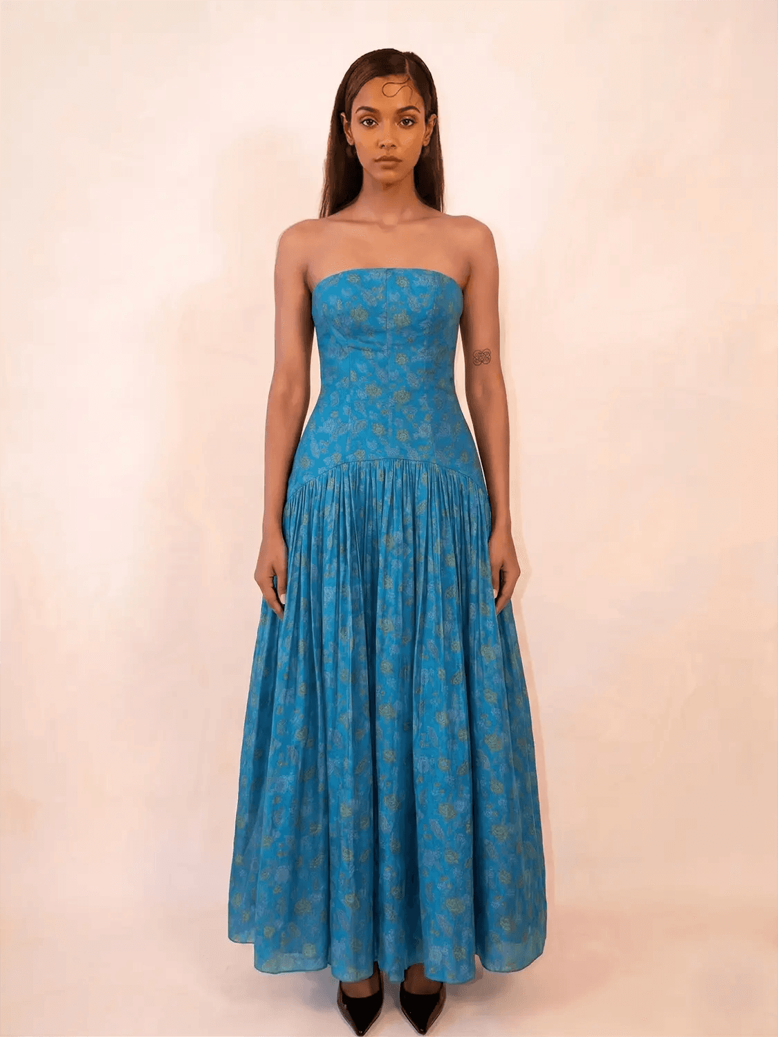 NOOR IV is our one-of-a-kind orange printed silk drop-waist dress