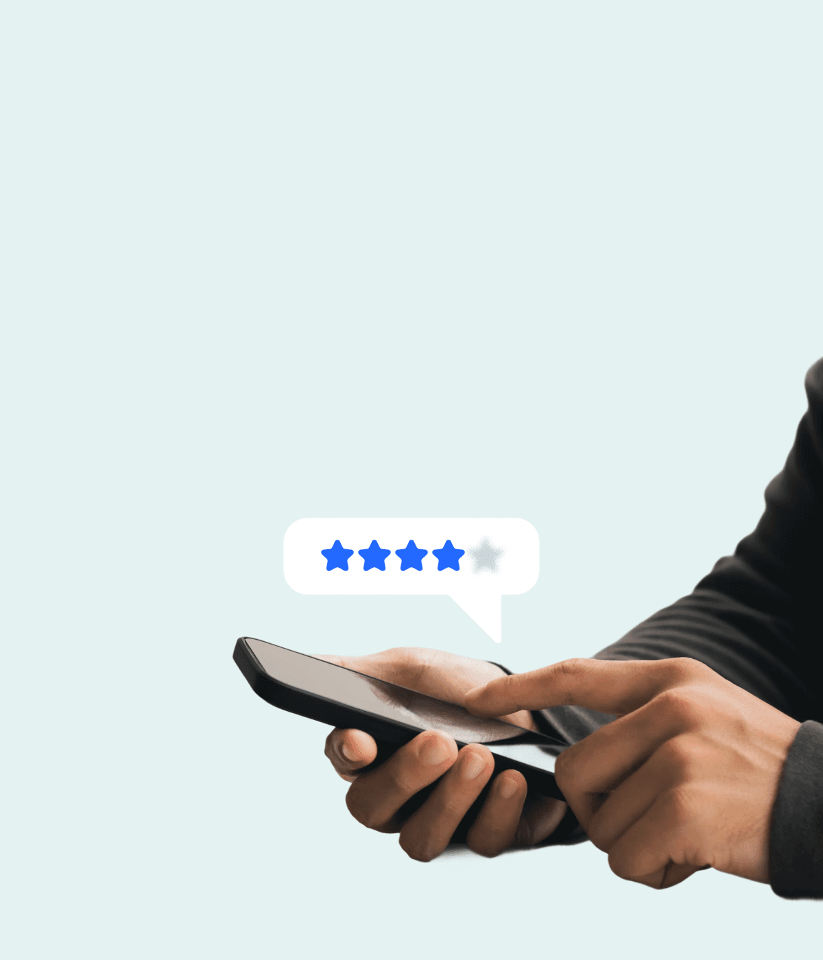 A person's hand holding a smartphone with a speech bubble displaying text. The background is light blue.