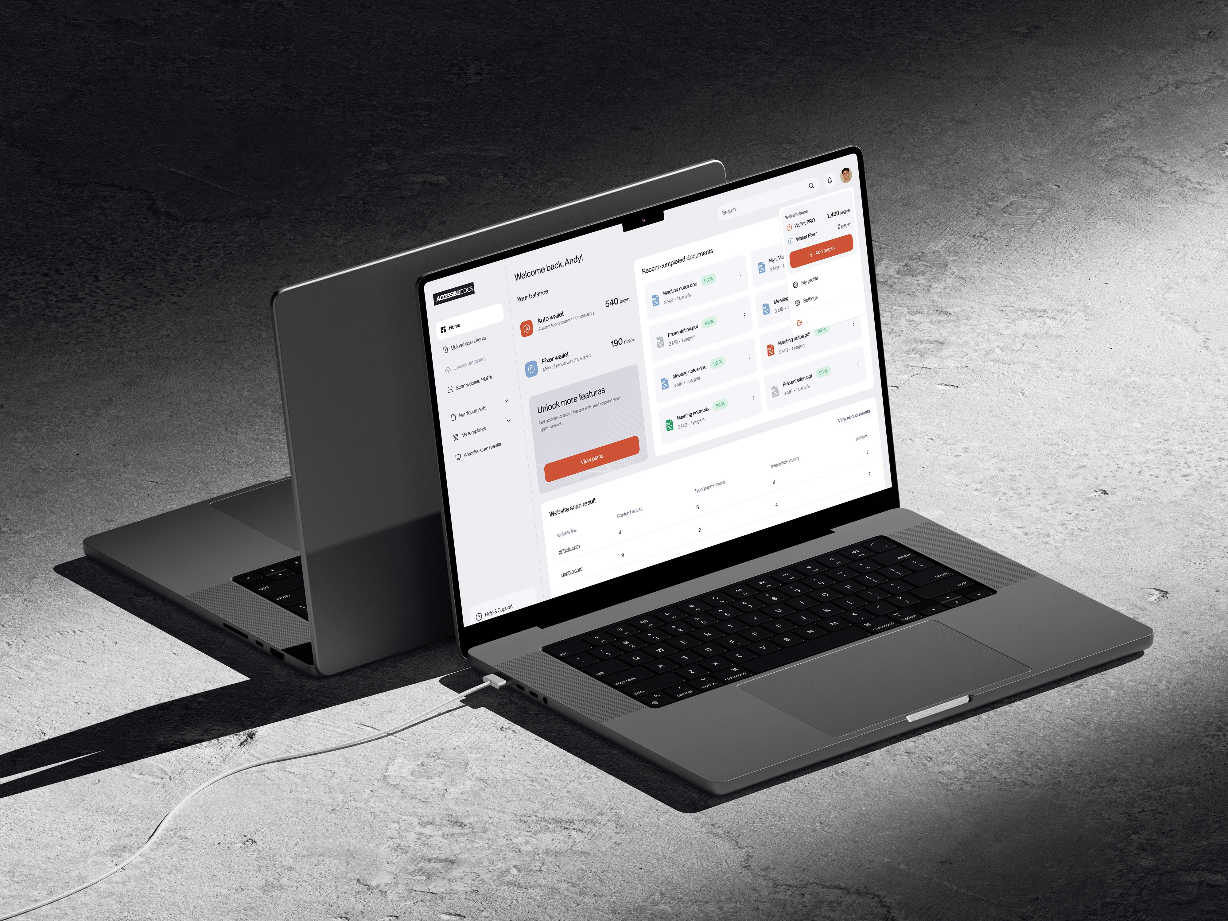 a cellphone leaning against a wall