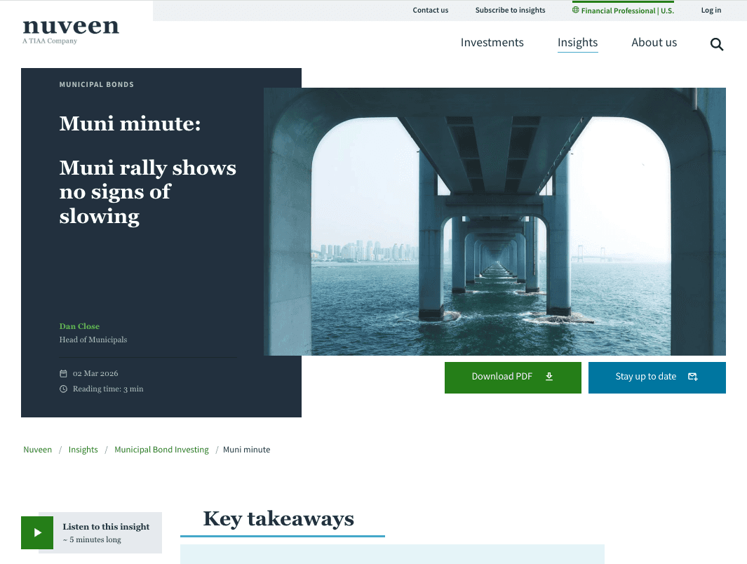 a person sitting in front of a computer screen