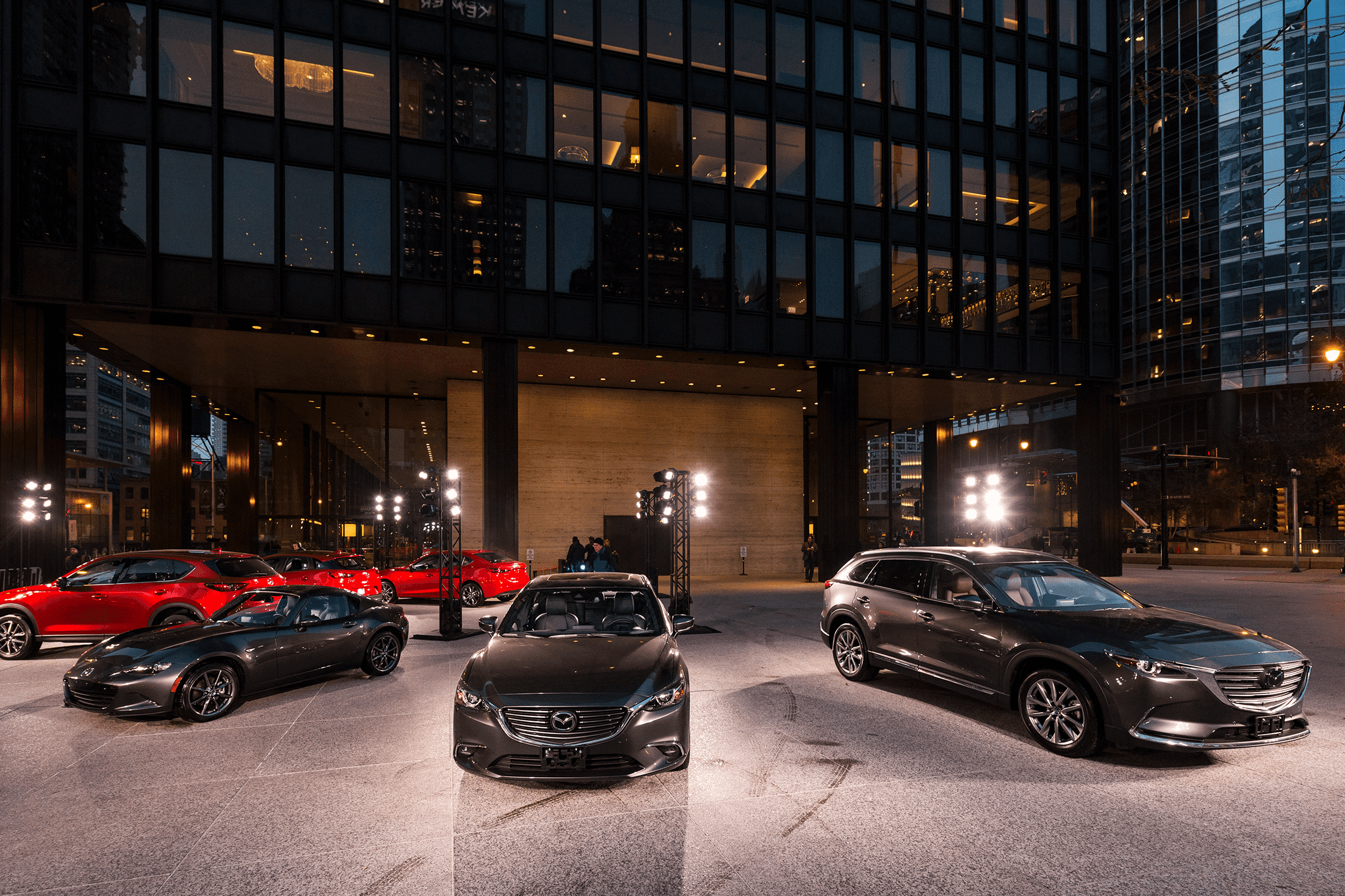 Mazda show cars outside a highrise in Chicago