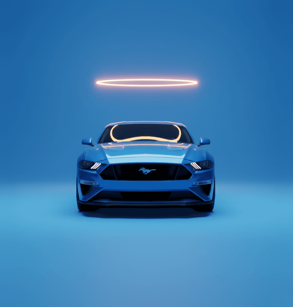 Beautiful blue Mustang on a blue background with the Carvana halo over it.