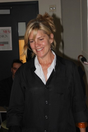 portrait of a woman dressed in black and white shirt