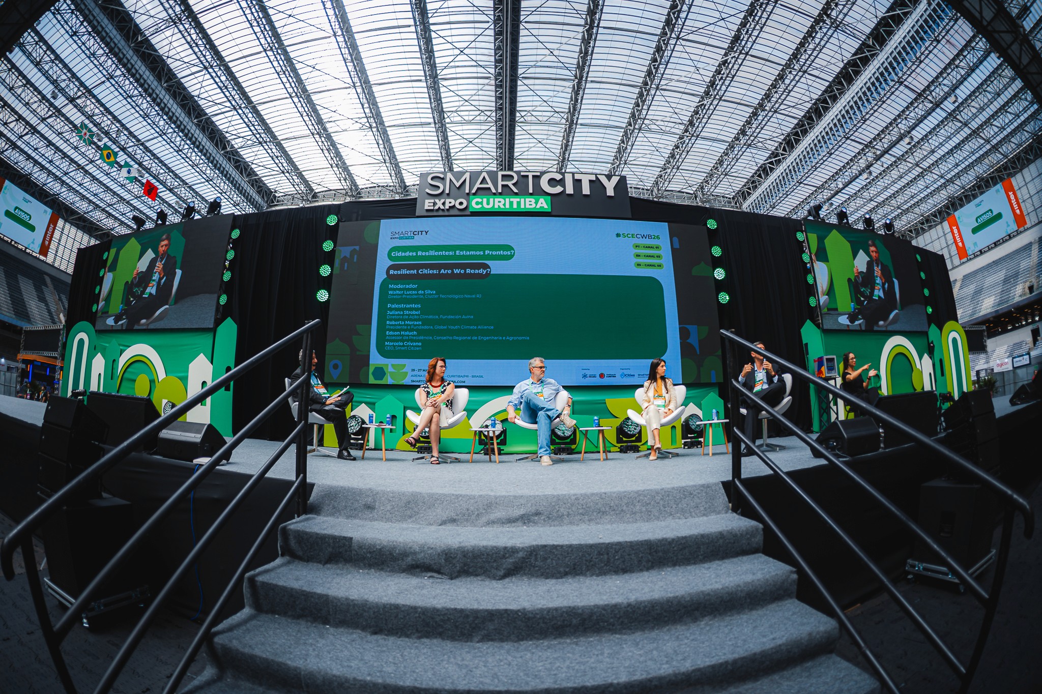 a black and white living room with a large tv