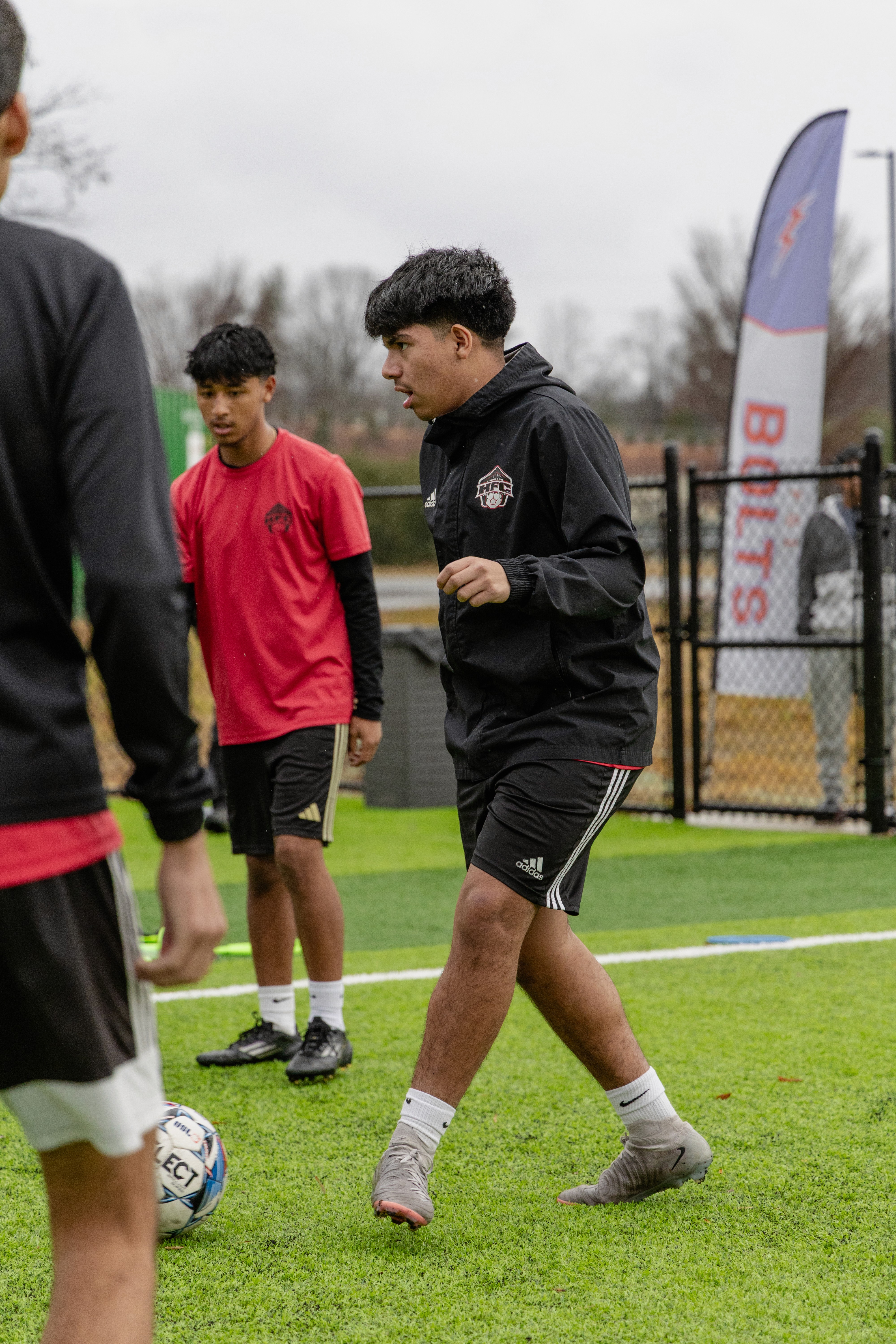 man in white crew neck shirt wearing black framed eyeglasses