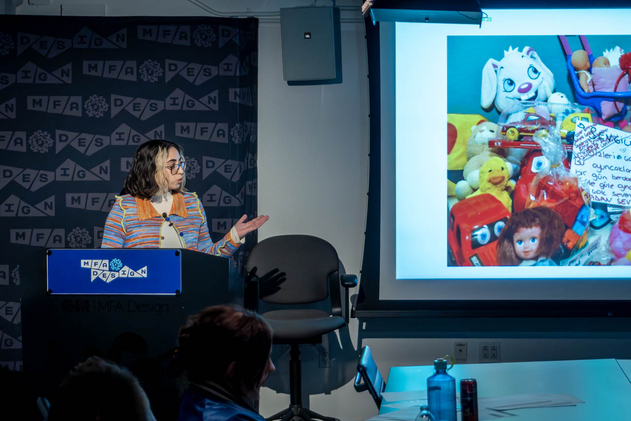 Woman at a podium delivering a presentation