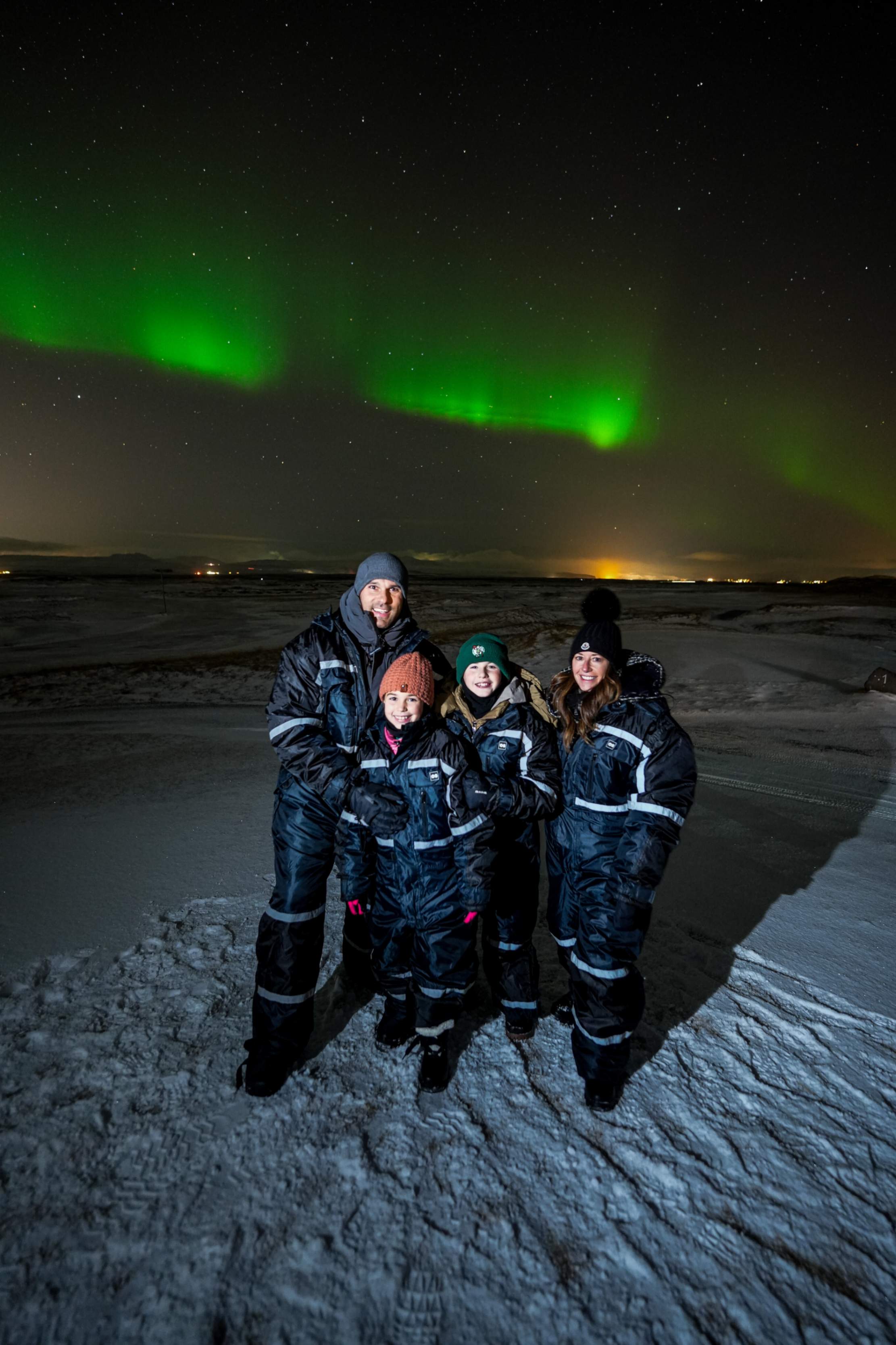 Northern Lights tour photography from Aurora Experts in Iceland, featuring guests beneath the aurora, winter landscapes, and vivid skies over remote Icelandic locations.