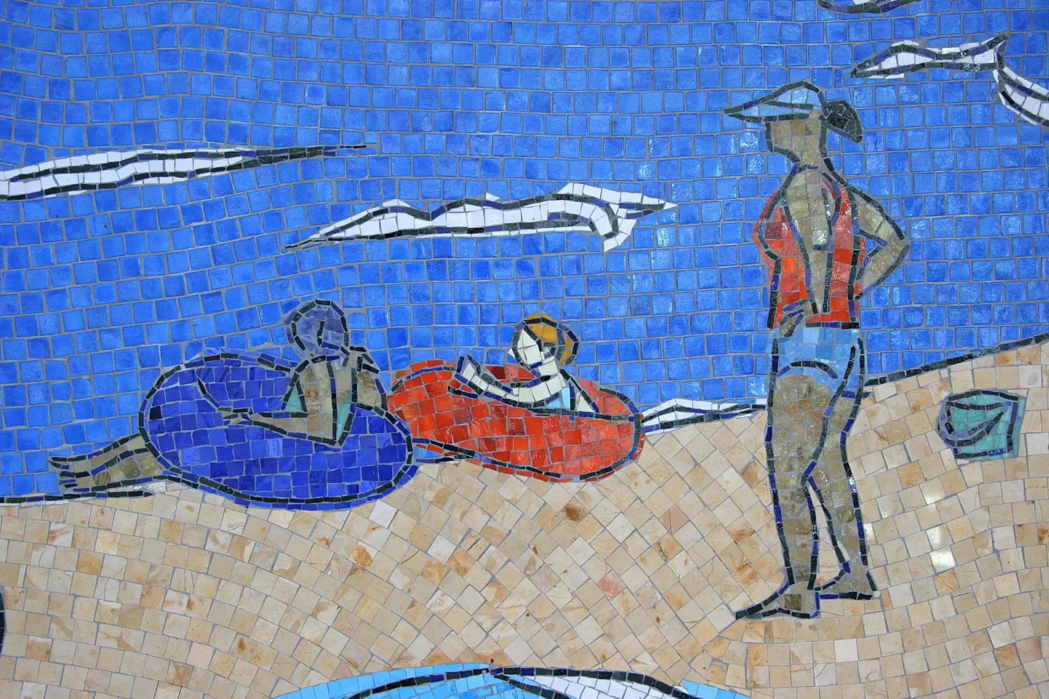 Mosaic mural depicting beachgoers at San Diego Airport, celebrating Pacific Ocean scenery with vibra.