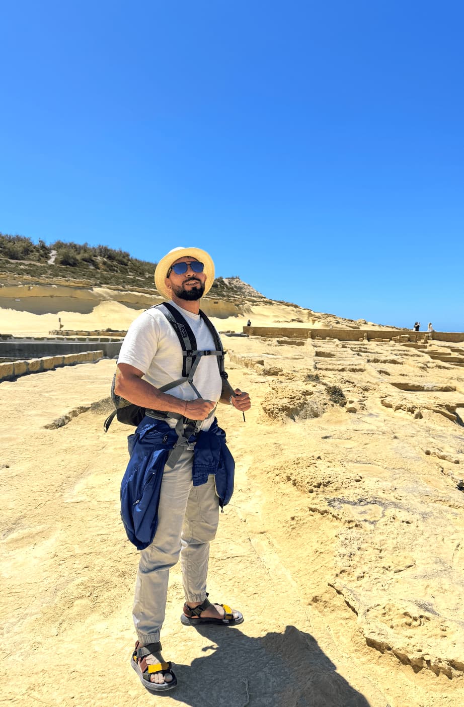 brown starfish on blue sand