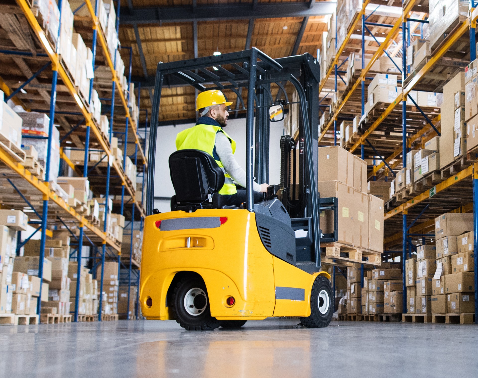 Forklift truck in warehouse