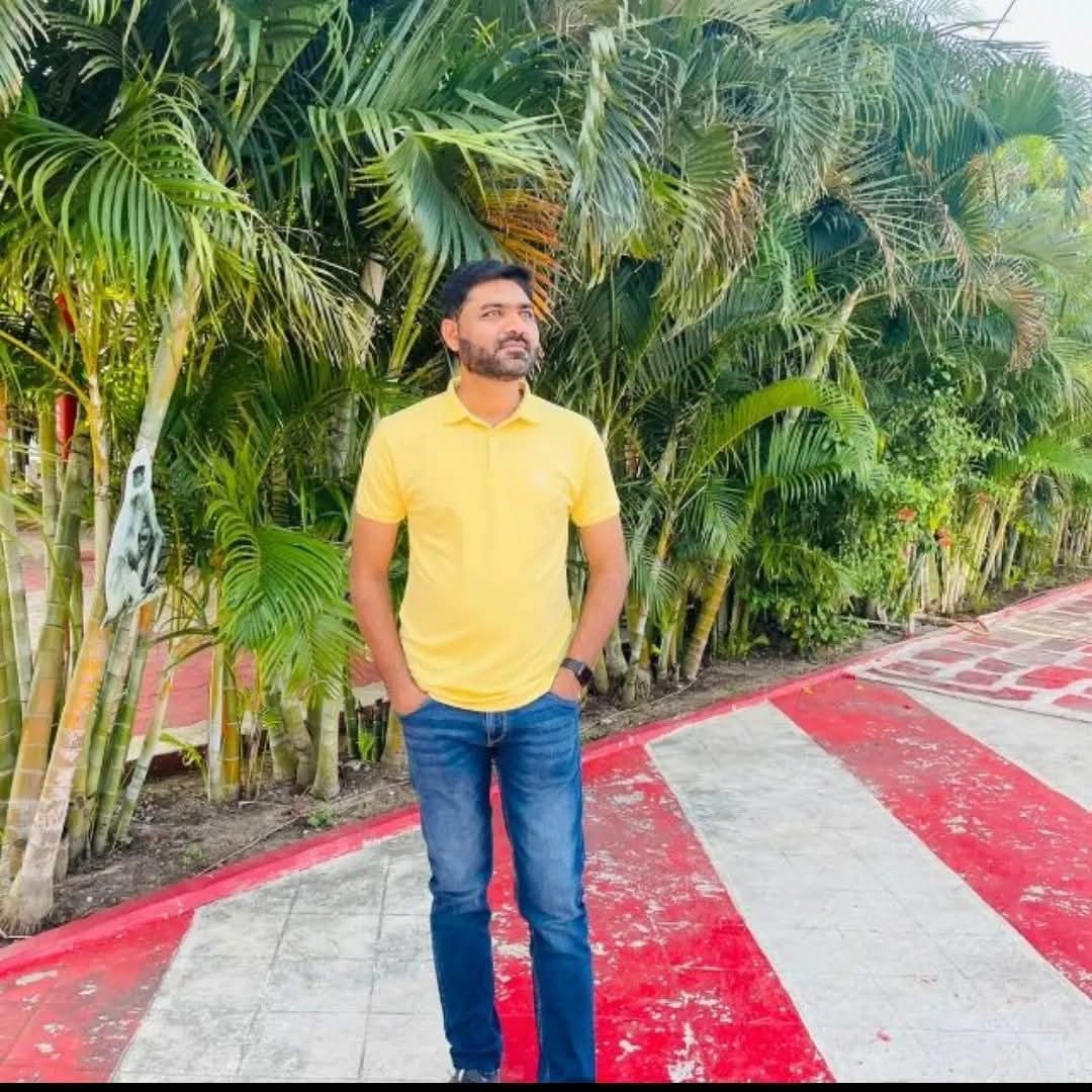 A cartoon character wearing a blue shirt and a blue hat