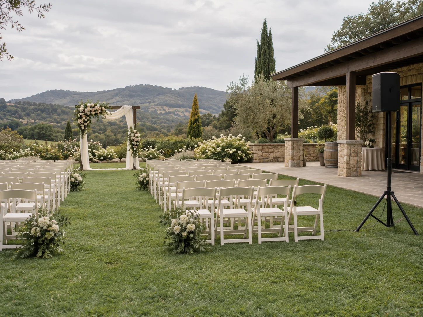 Wedding sound guide illustration of an outdoor ceremony with seating, a clear aisle and sound equipment.