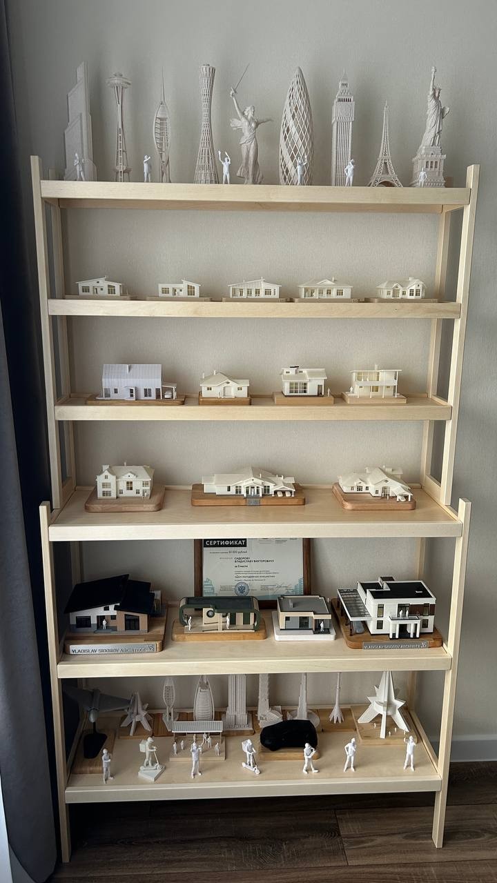 Shelves with 3d printed houses prototypes