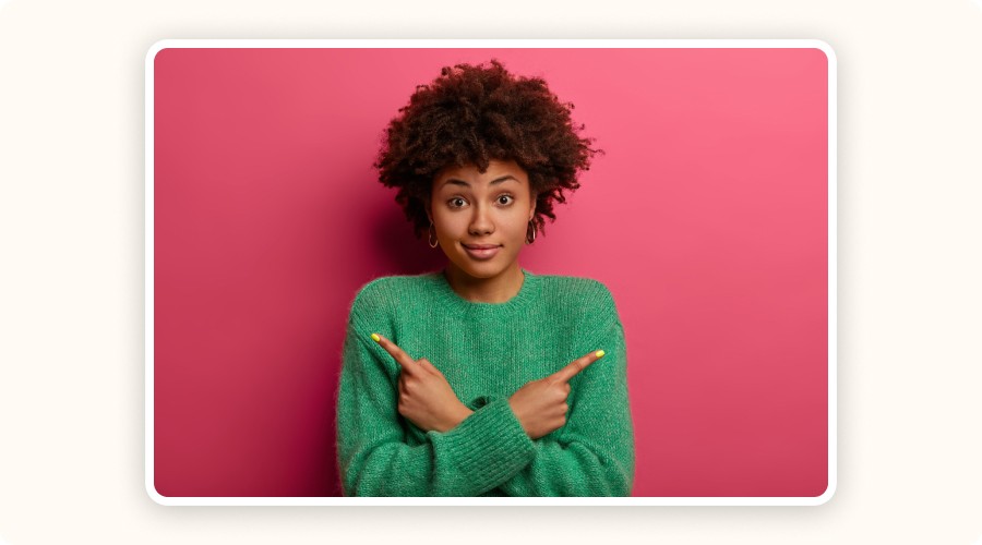 Woman pointing in opposite directions