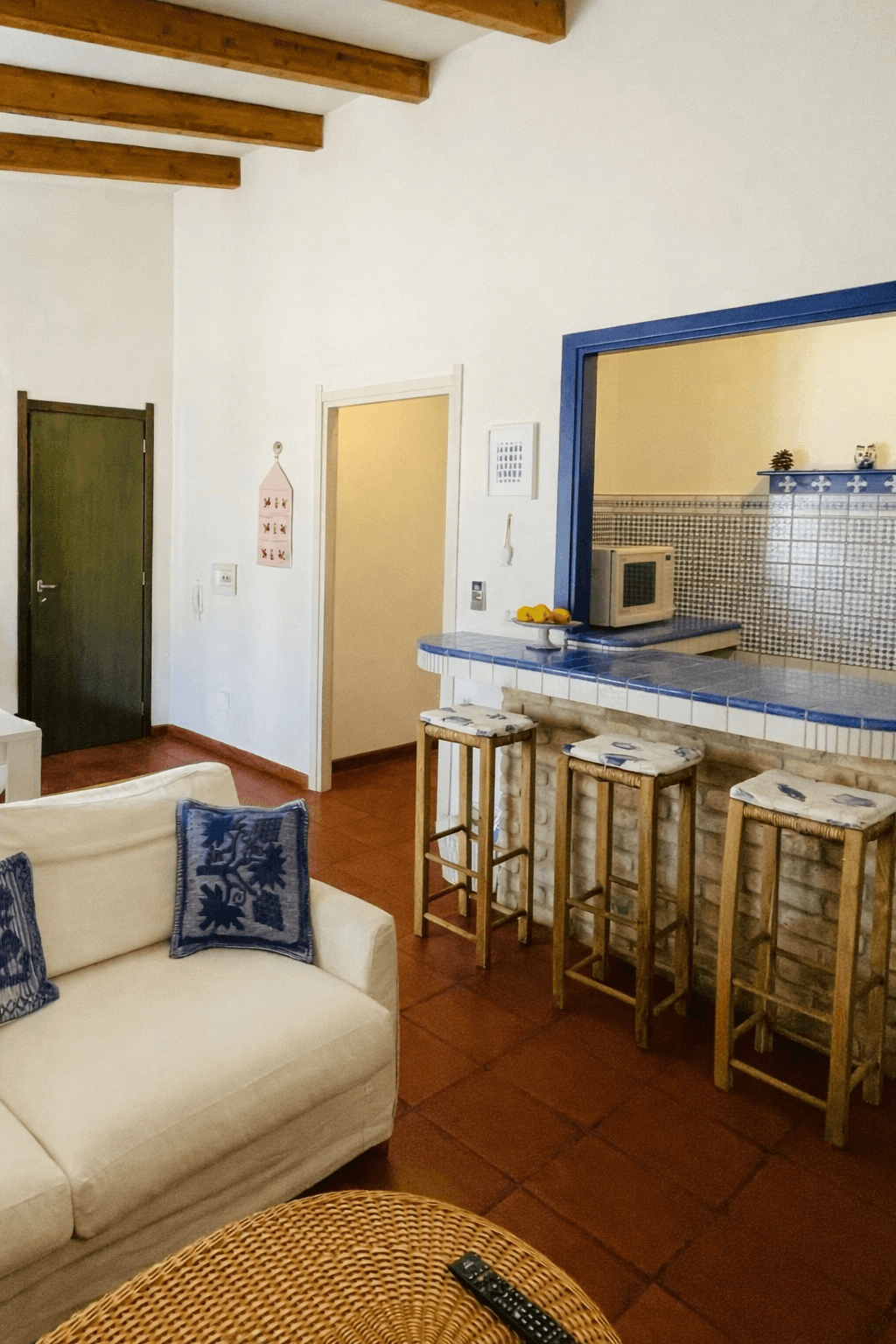 Zona giorno del Trilocale Casa Lia con cucina a vista