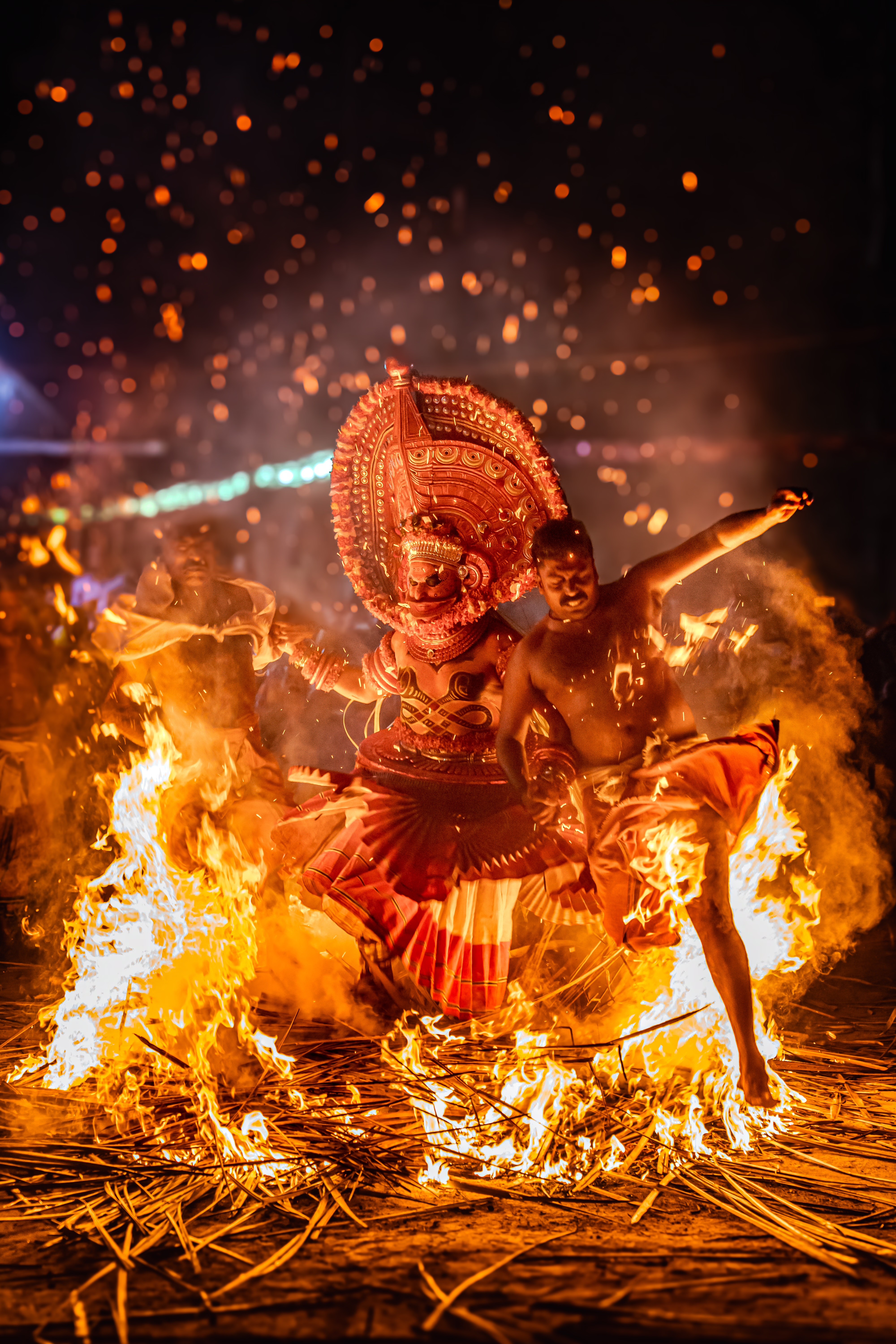 The Inferno Walker - A devotee traverses the boundary between man and myth, illuminated by the sparks of the ritual fire.