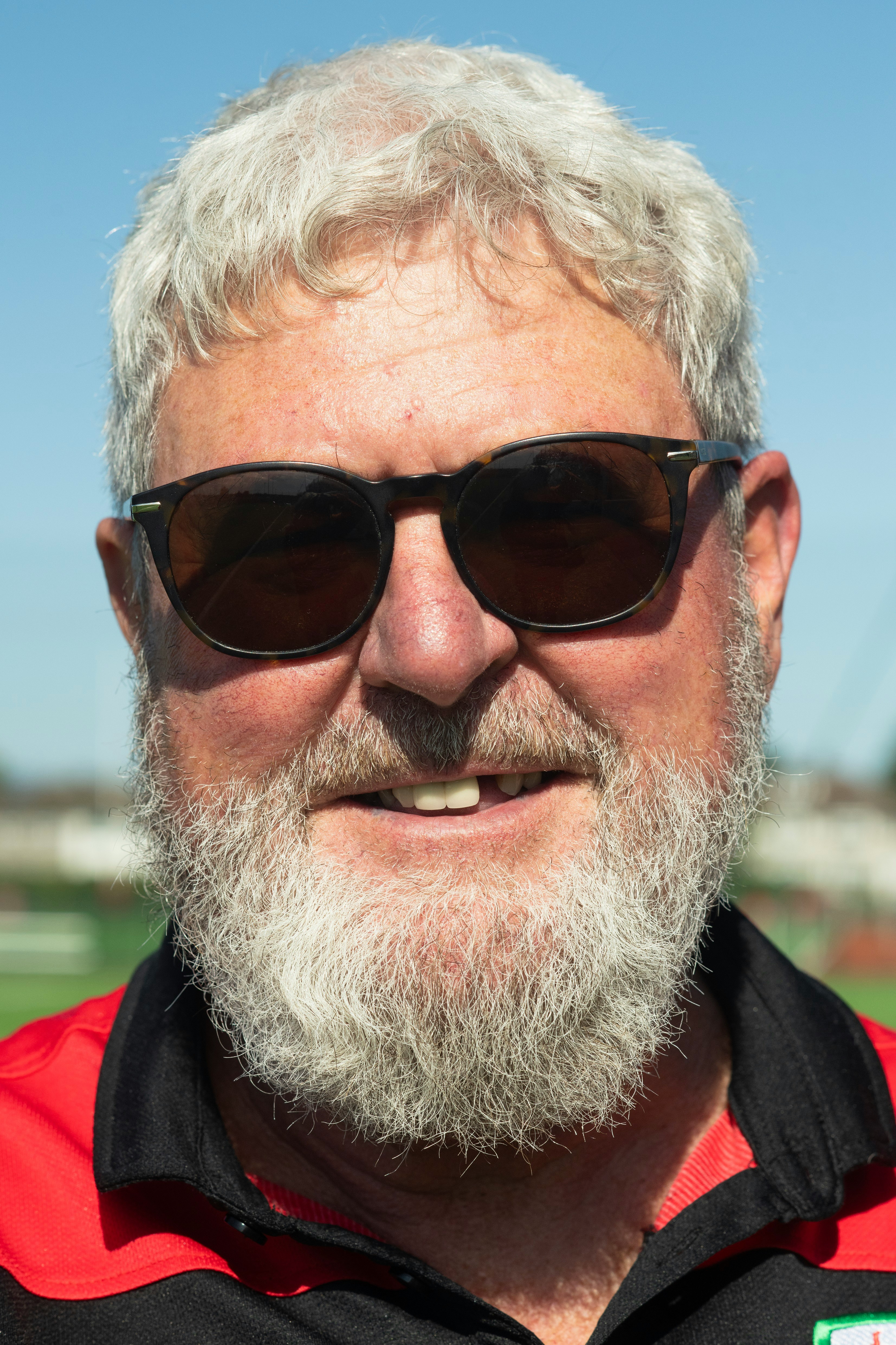 A man with a white beard wearing sunglasses