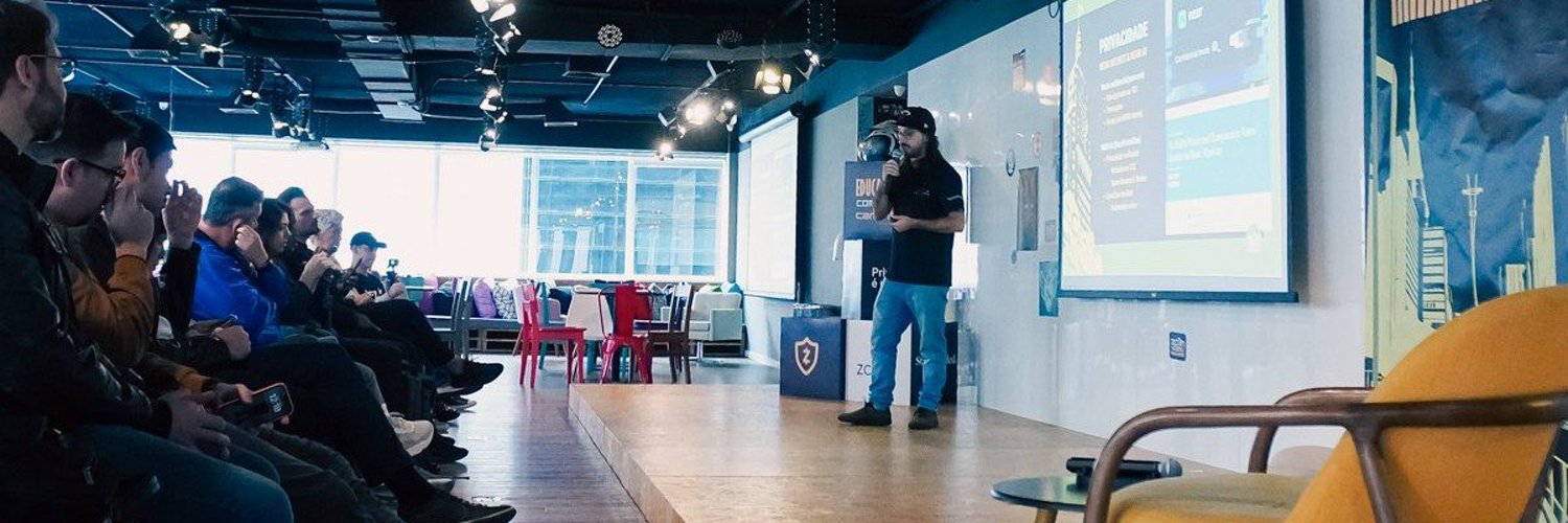Vini Barbosa speaking at an event