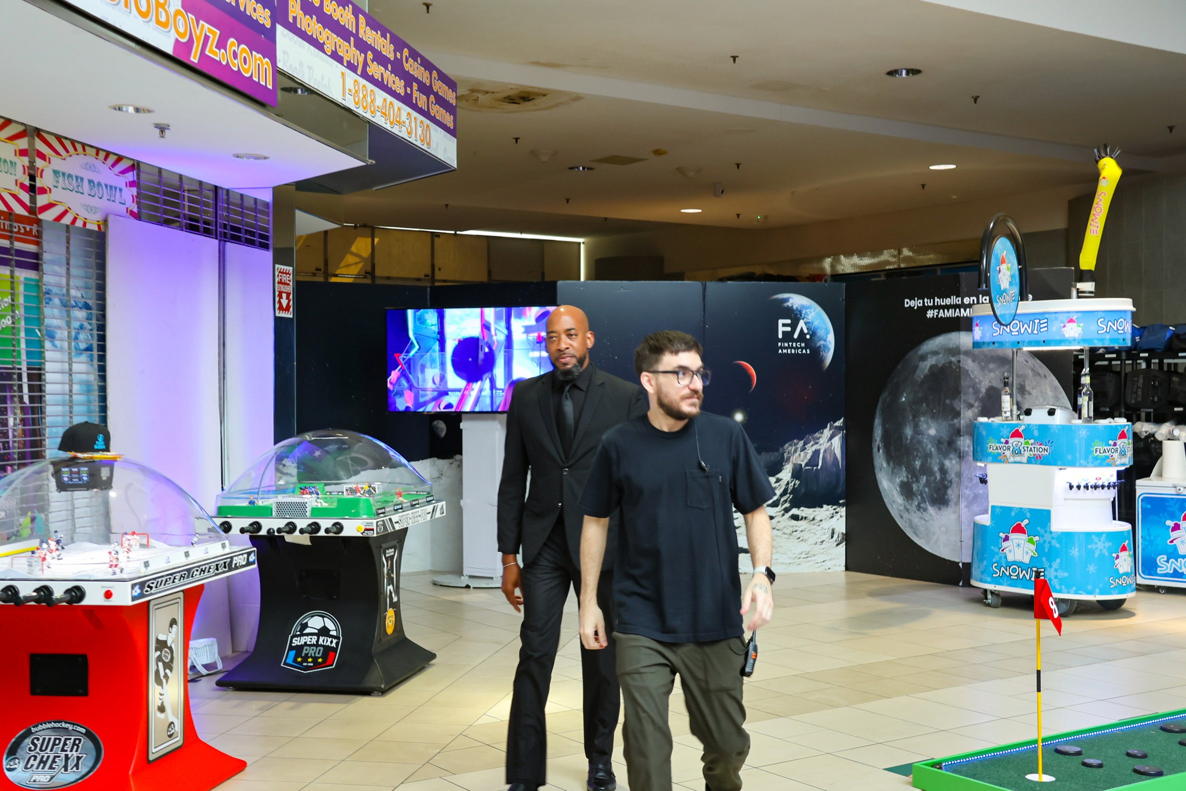 Indoor mall activation with arcade games, mini golf, and event-style branded installations.